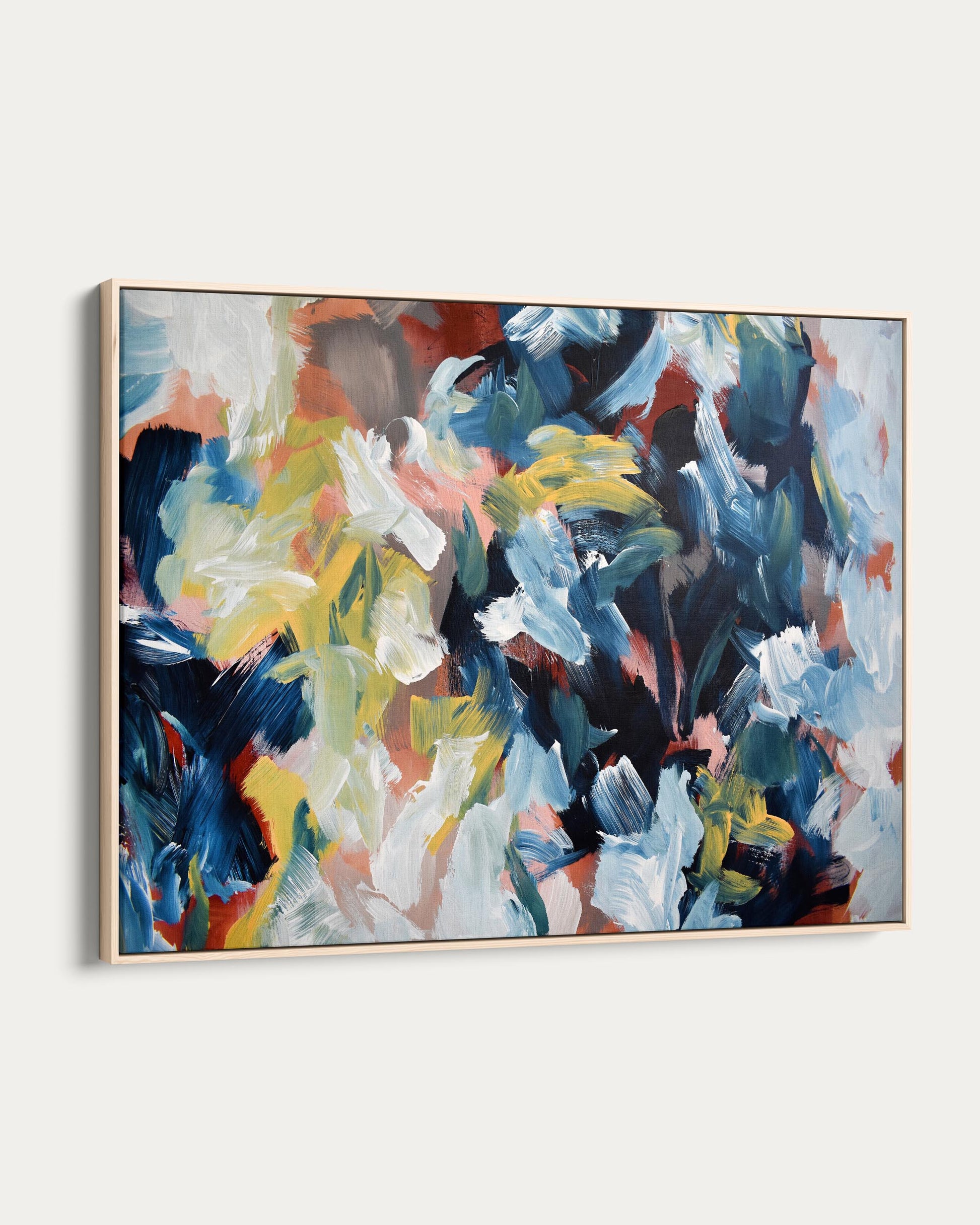 Abstract painting with colorful brush strokes on a white wall
