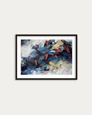 Framed abstract painting with colorful brush strokes on a white wall