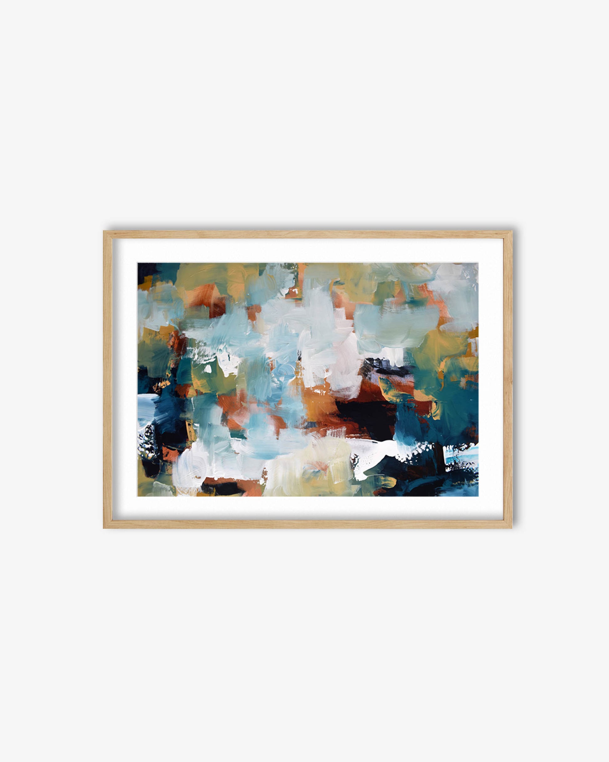 Framed abstract art print with multicolored brush strokes on a white wall