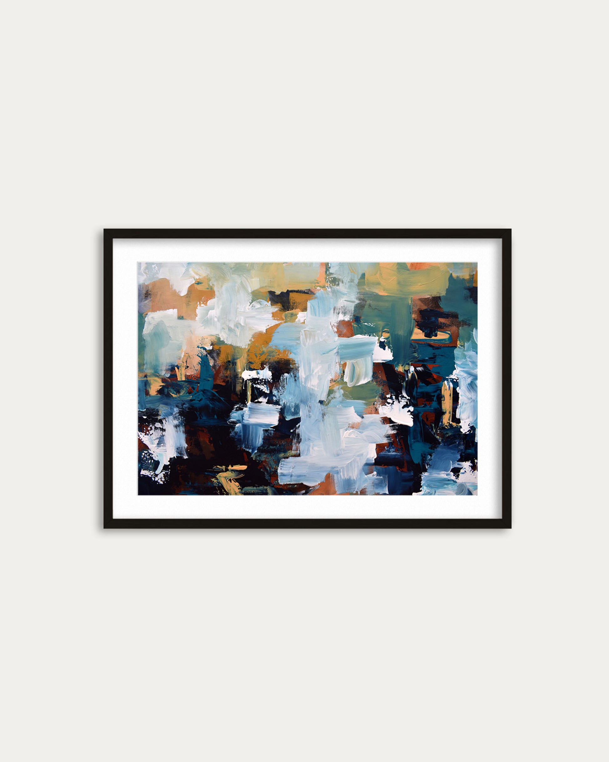 Framed abstract art print on a white wall