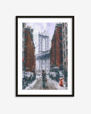 Framed artwork of a snowy city street scene with people walking.