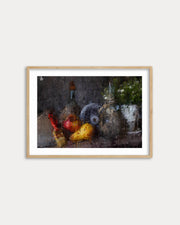 Framed artwork of a still life scene with various objects on a white wall.