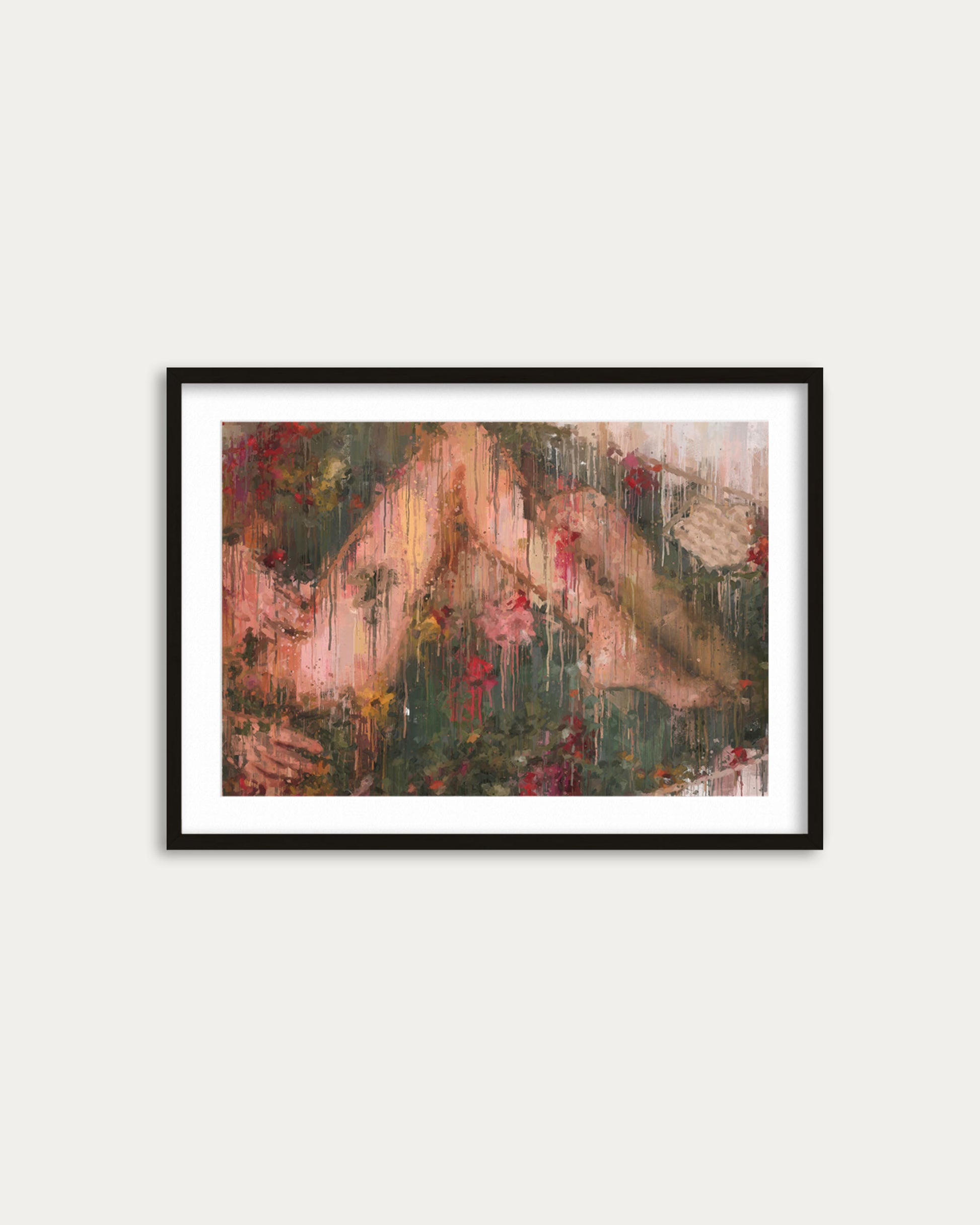 Framed abstract painting on a white wall