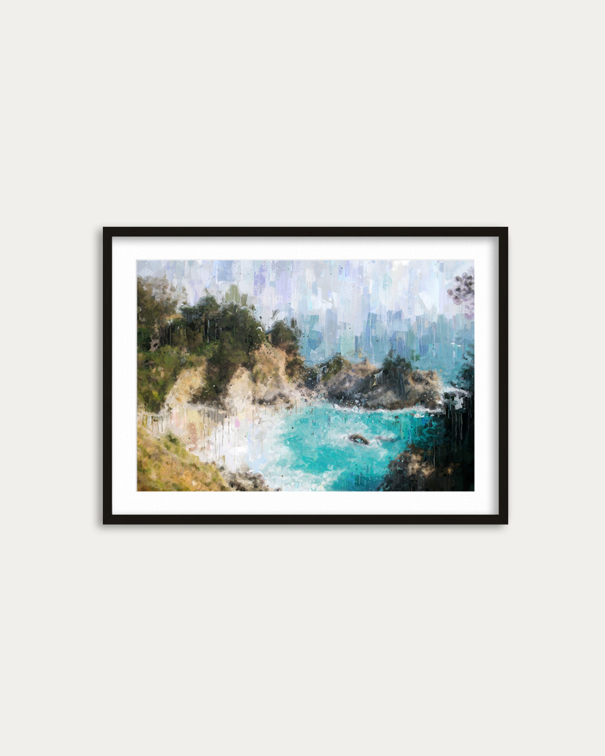 Framed artwork of a coastal scene with trees and blue water on a white wall.