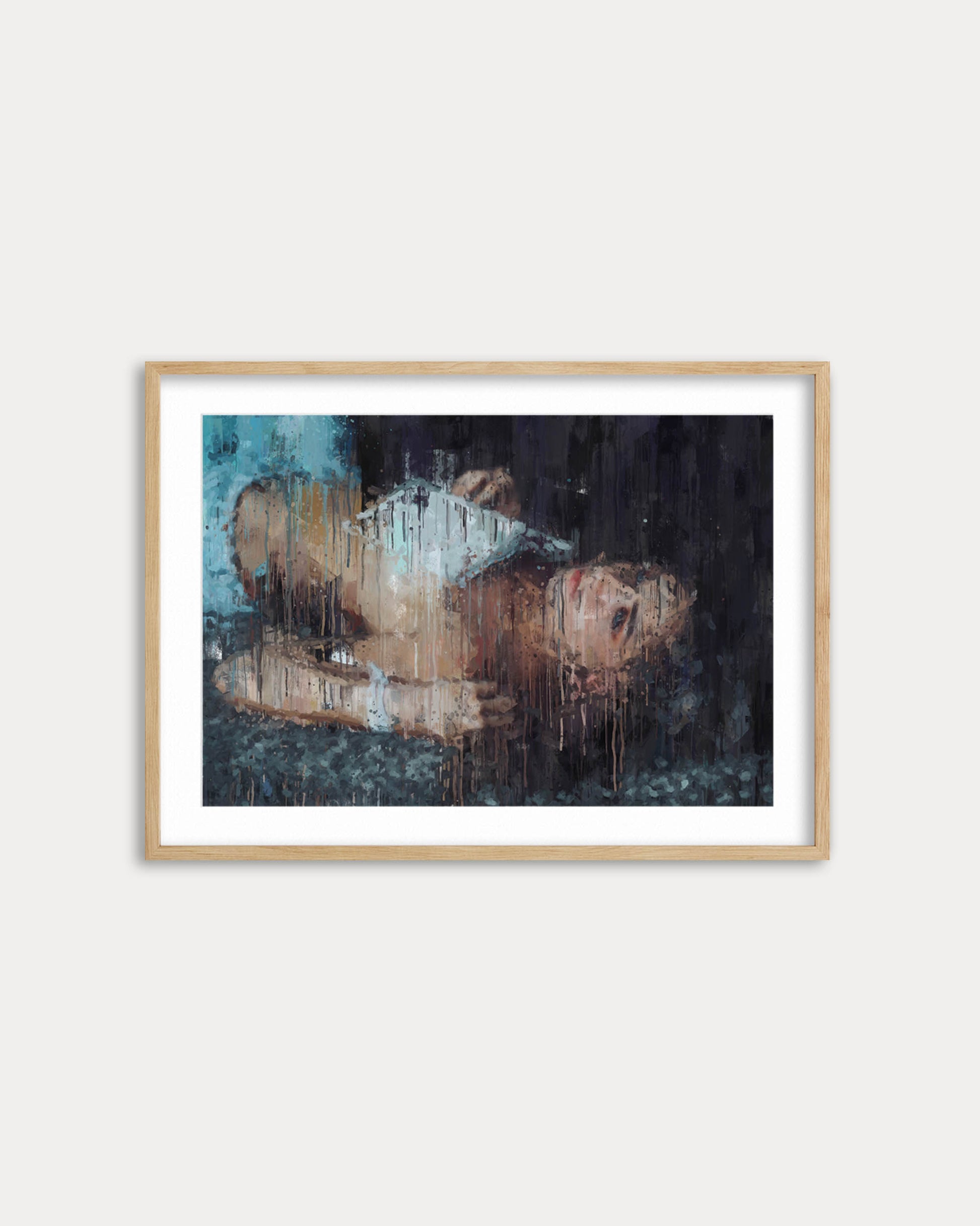 Framed abstract painting on a white wall