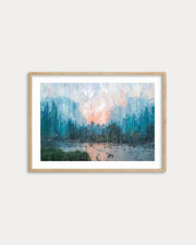Framed abstract landscape painting on a white wall
