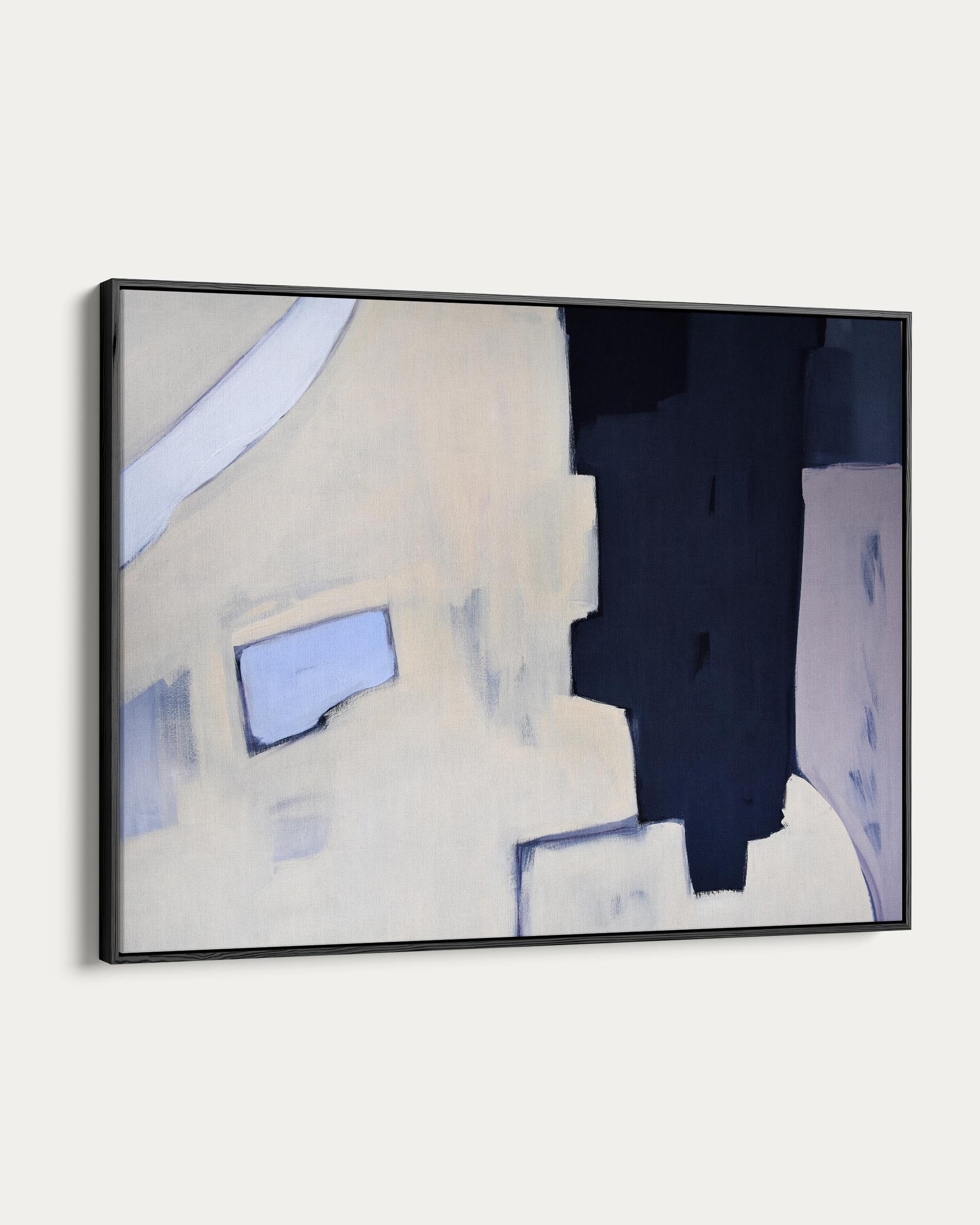 Framed abstract art with geometric shapes on a white background