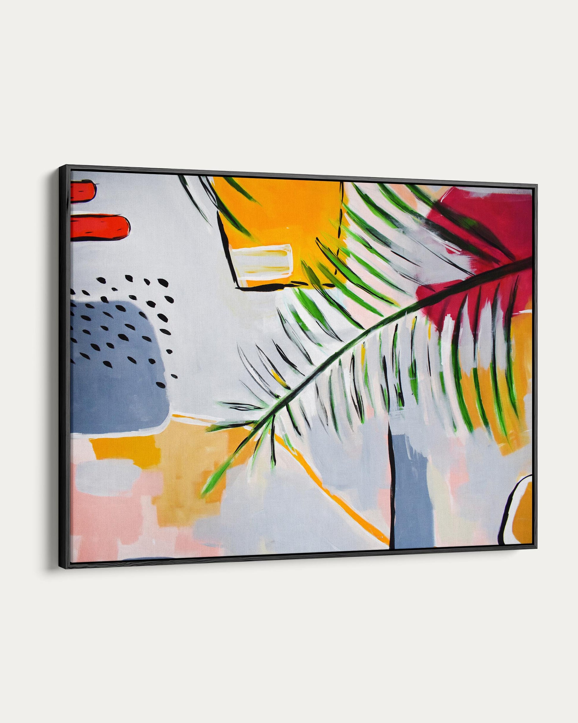 Abstract art piece with colorful shapes and a leaf on a white background