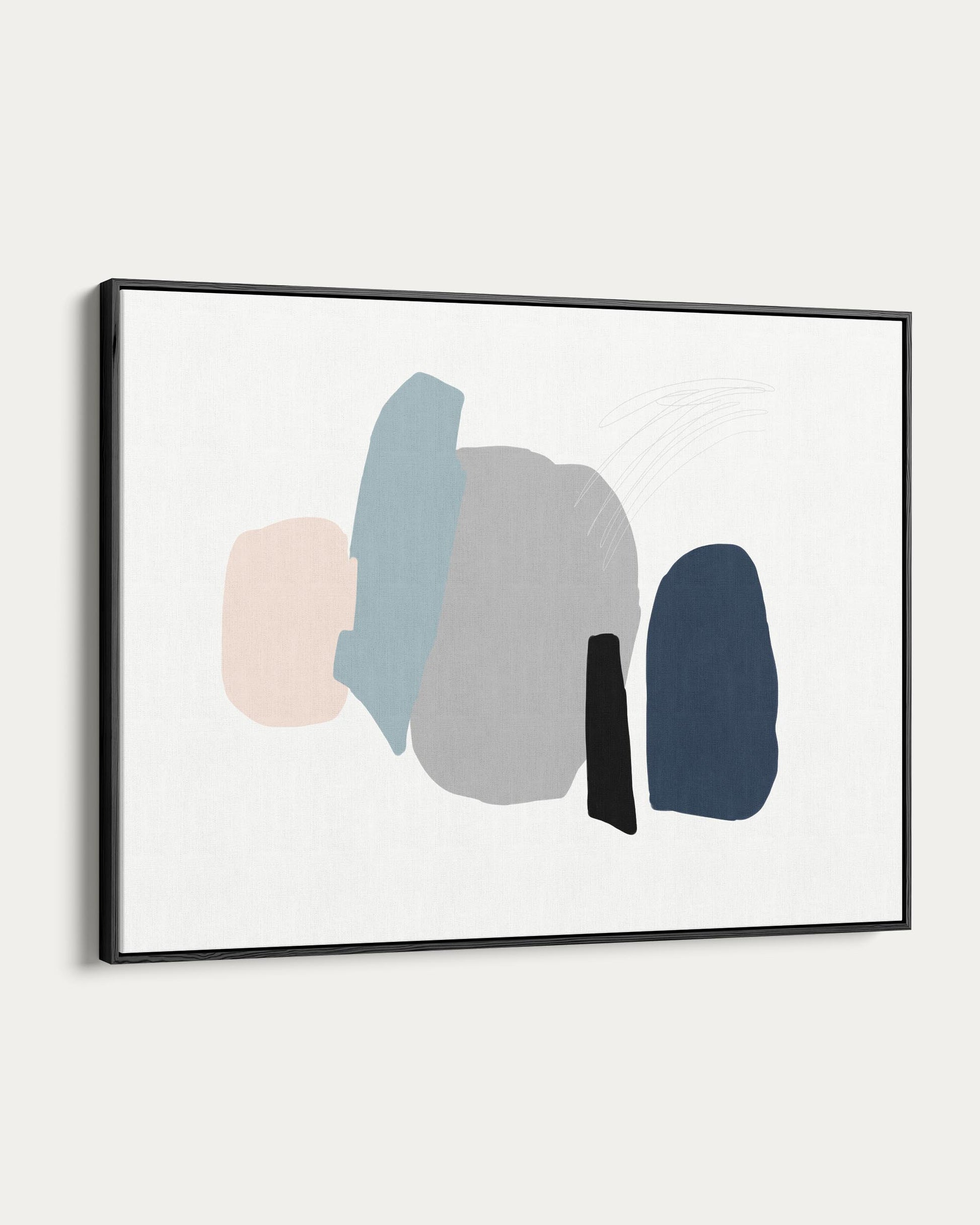 Framed abstract art with colorful shapes on a white background