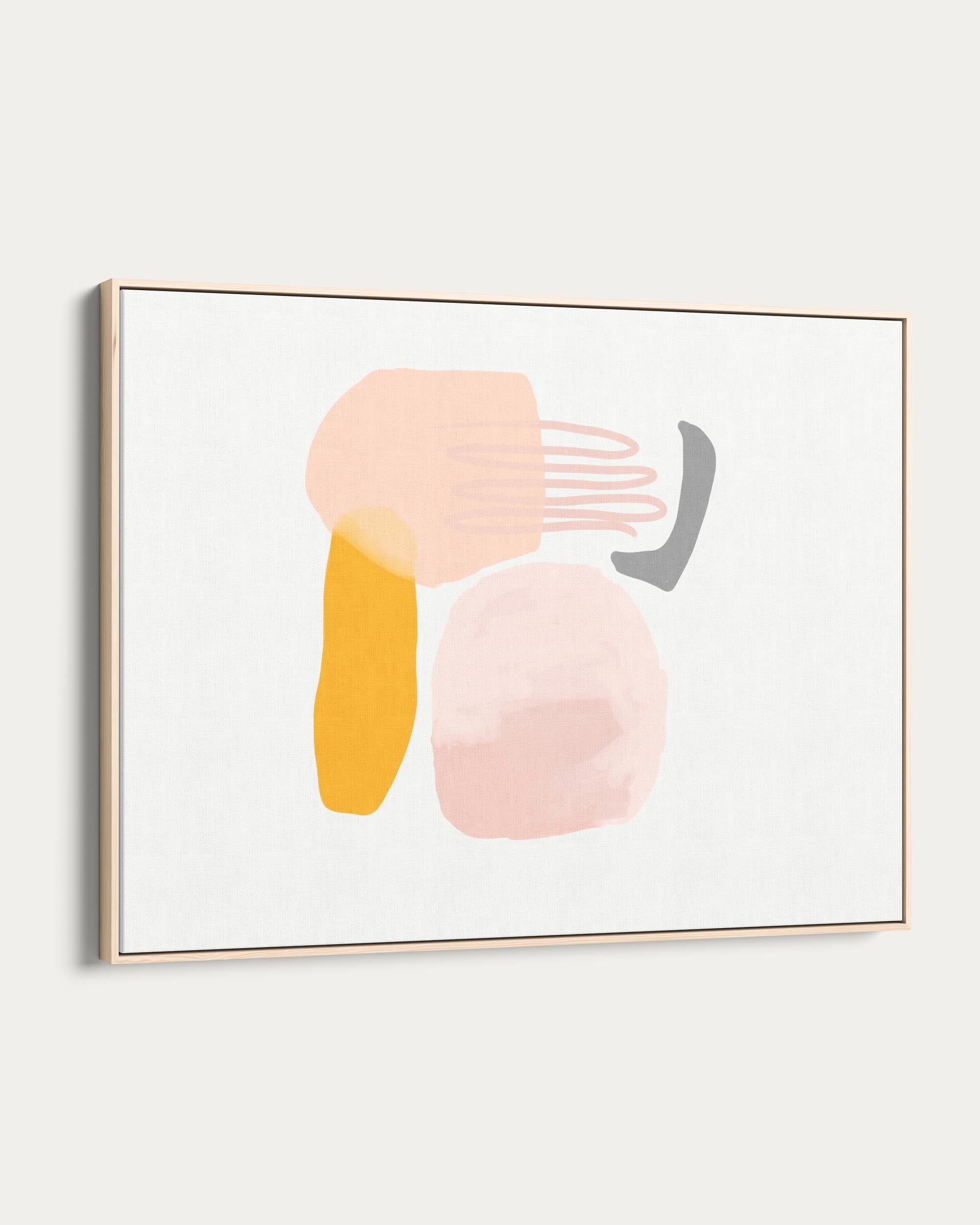 Framed abstract art with pastel colors on a white wall