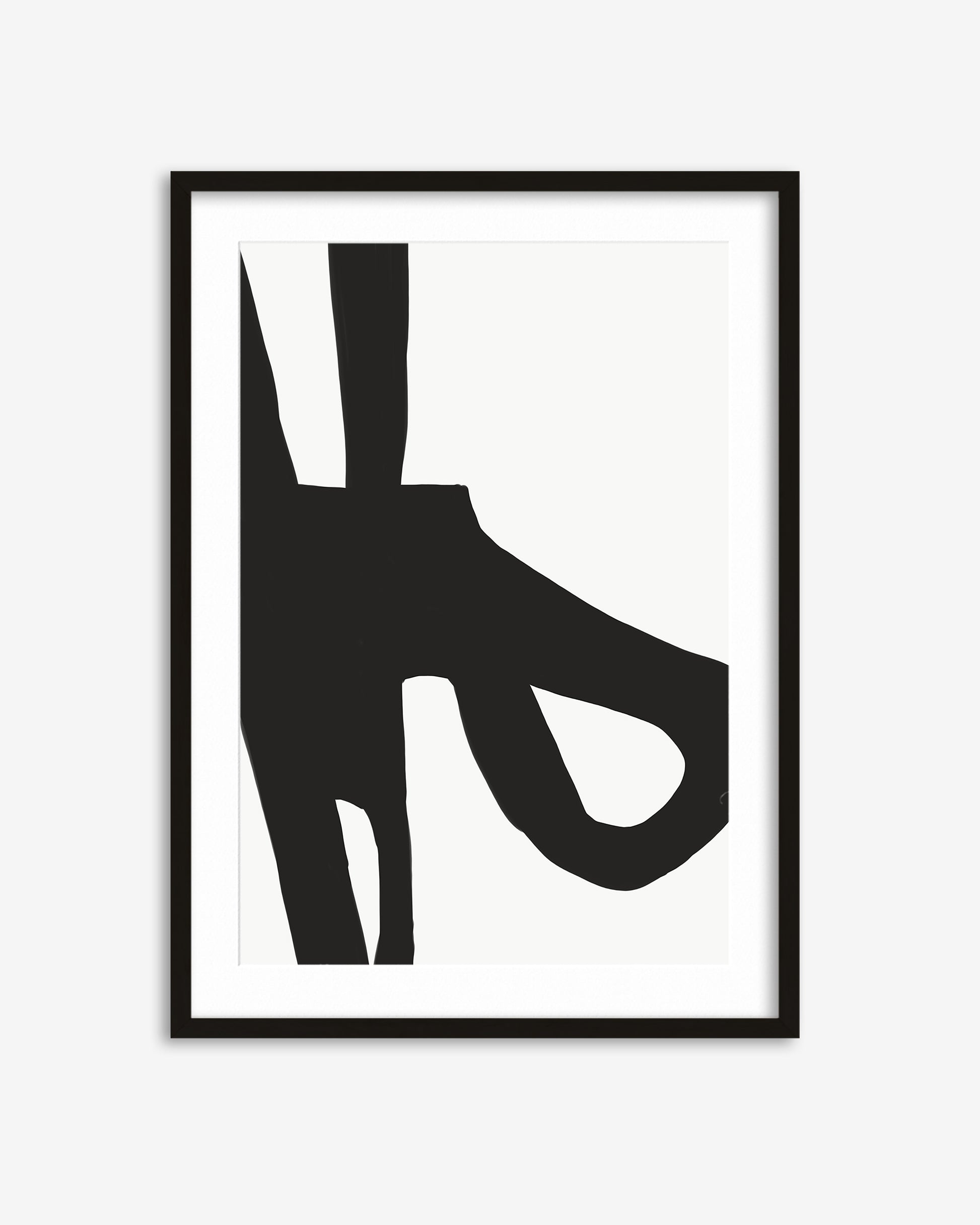 Framed black and white abstract art print on a white background