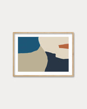 Abstract art print with geometric shapes in blue, beige, and red on a white wall.