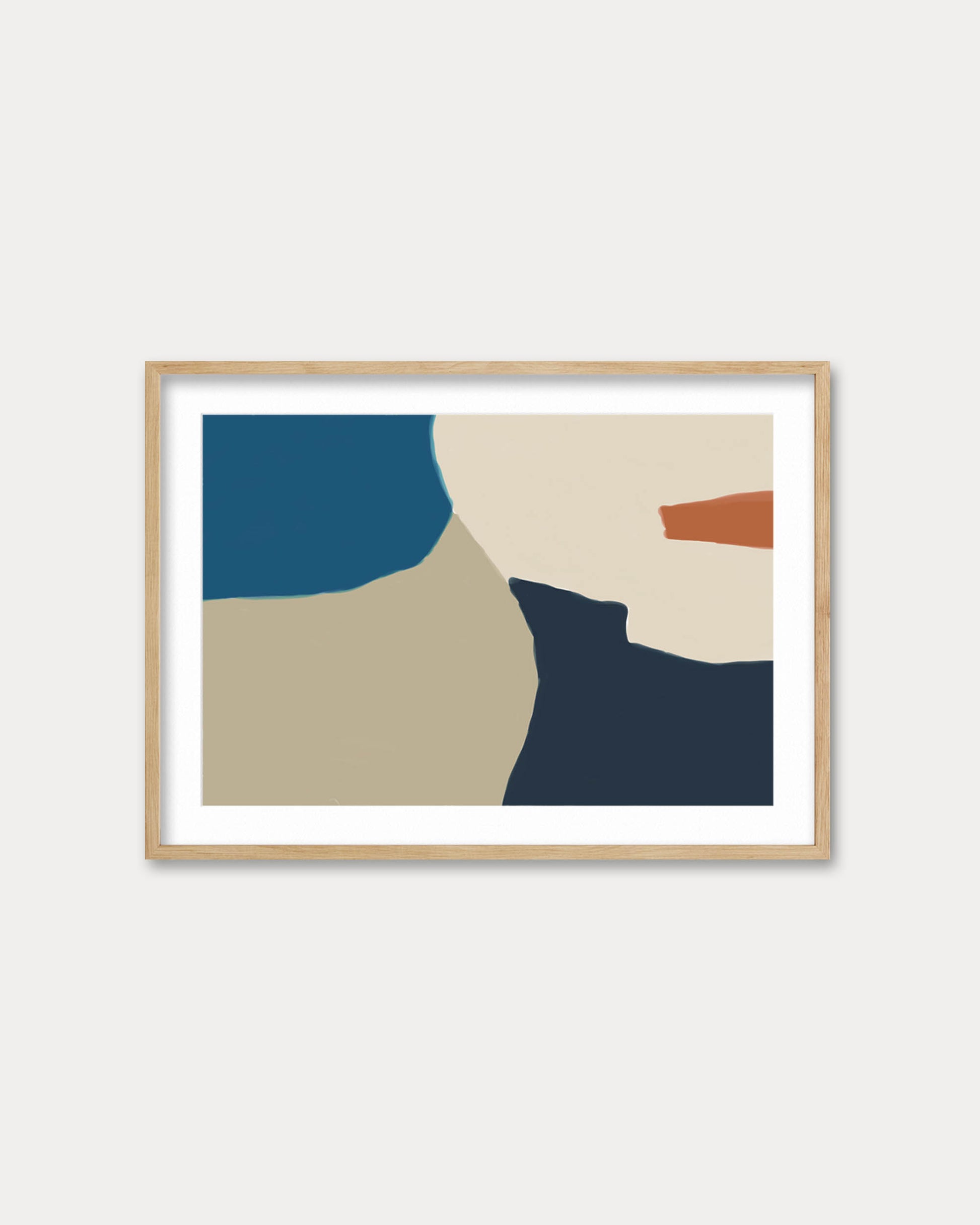 Abstract art print with geometric shapes in blue, beige, and red on a white wall.