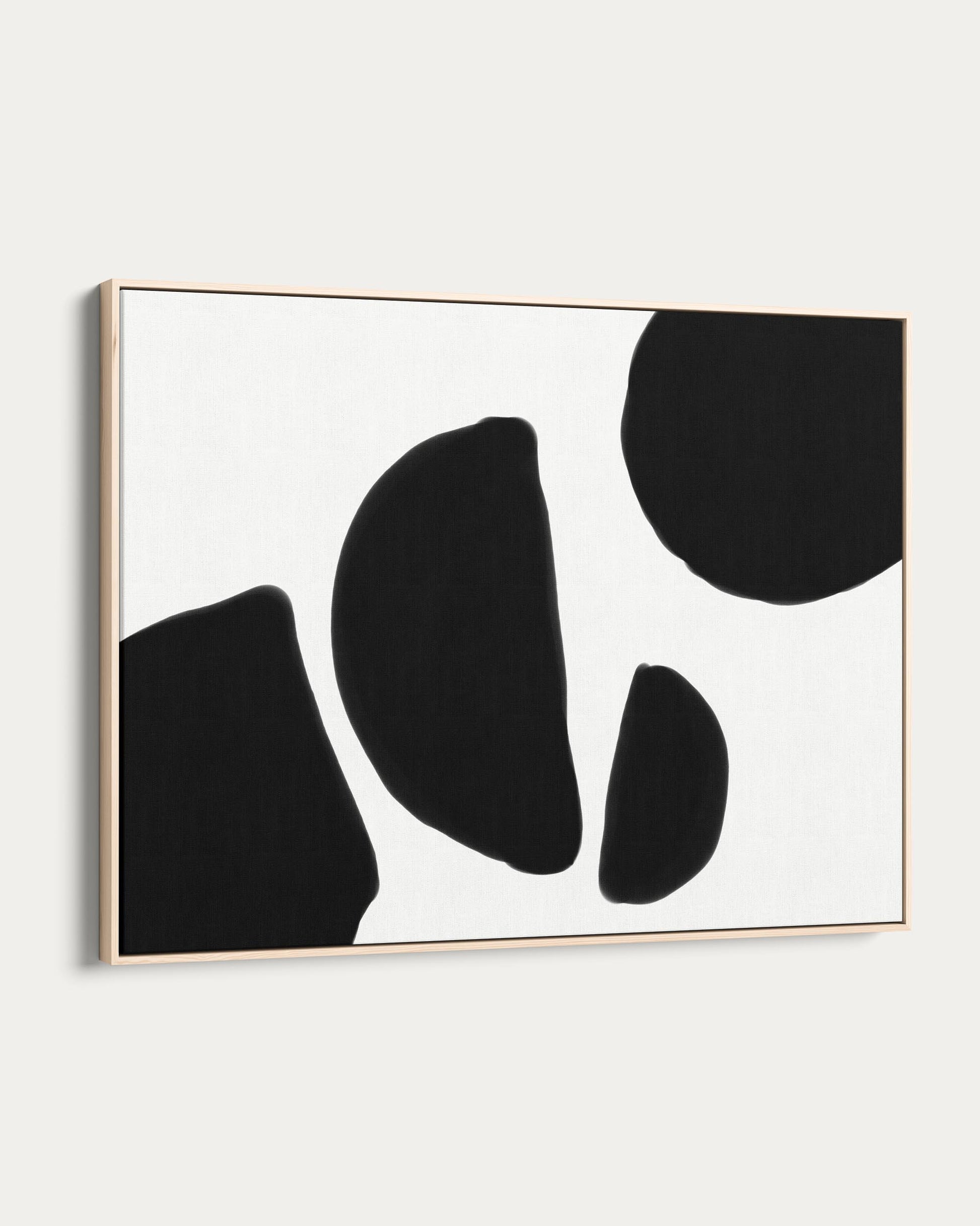 Abstract black shapes on a white background with a gold frame.