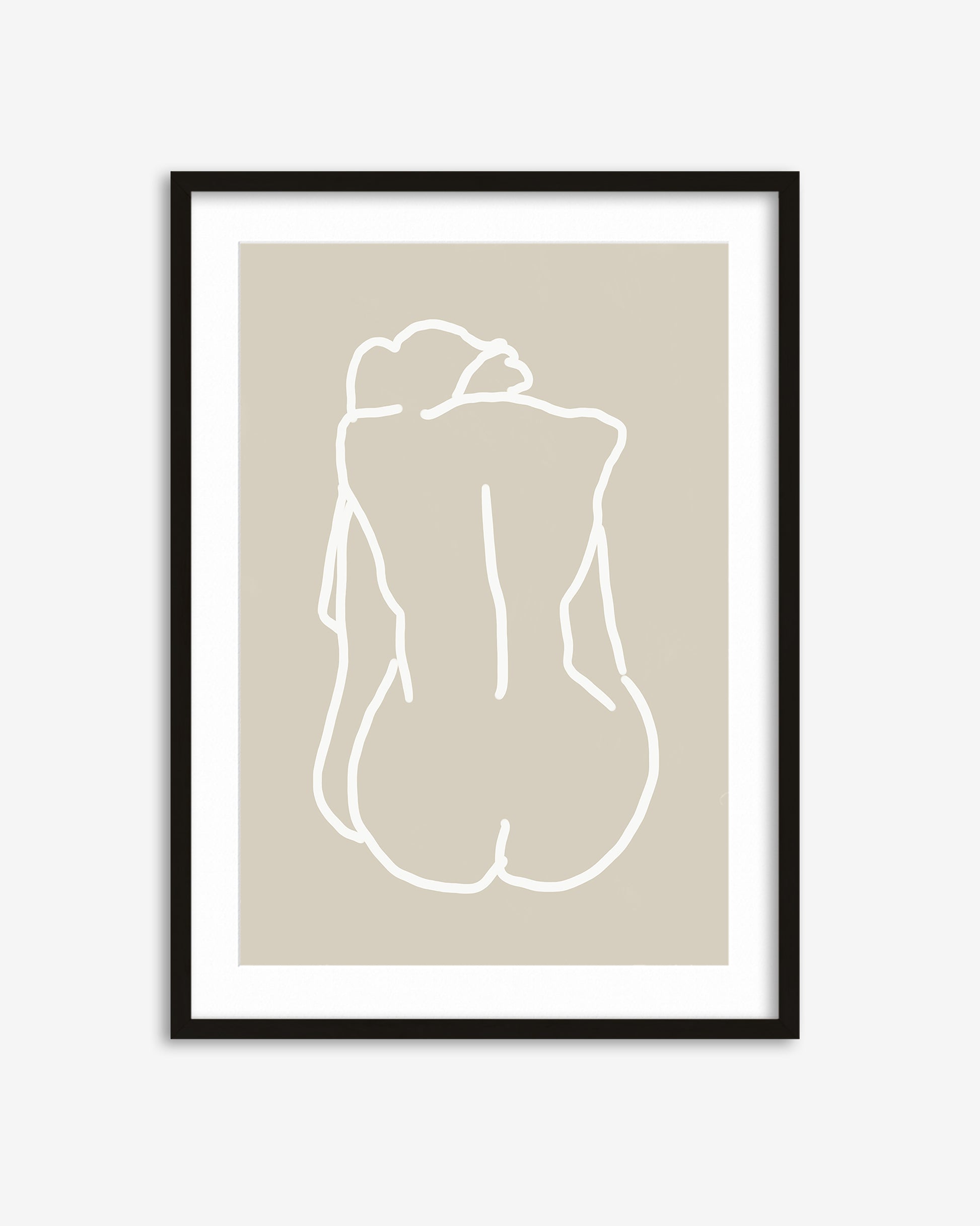 Framed artwork of a minimalistic line drawing of a nude figure on beige paper.