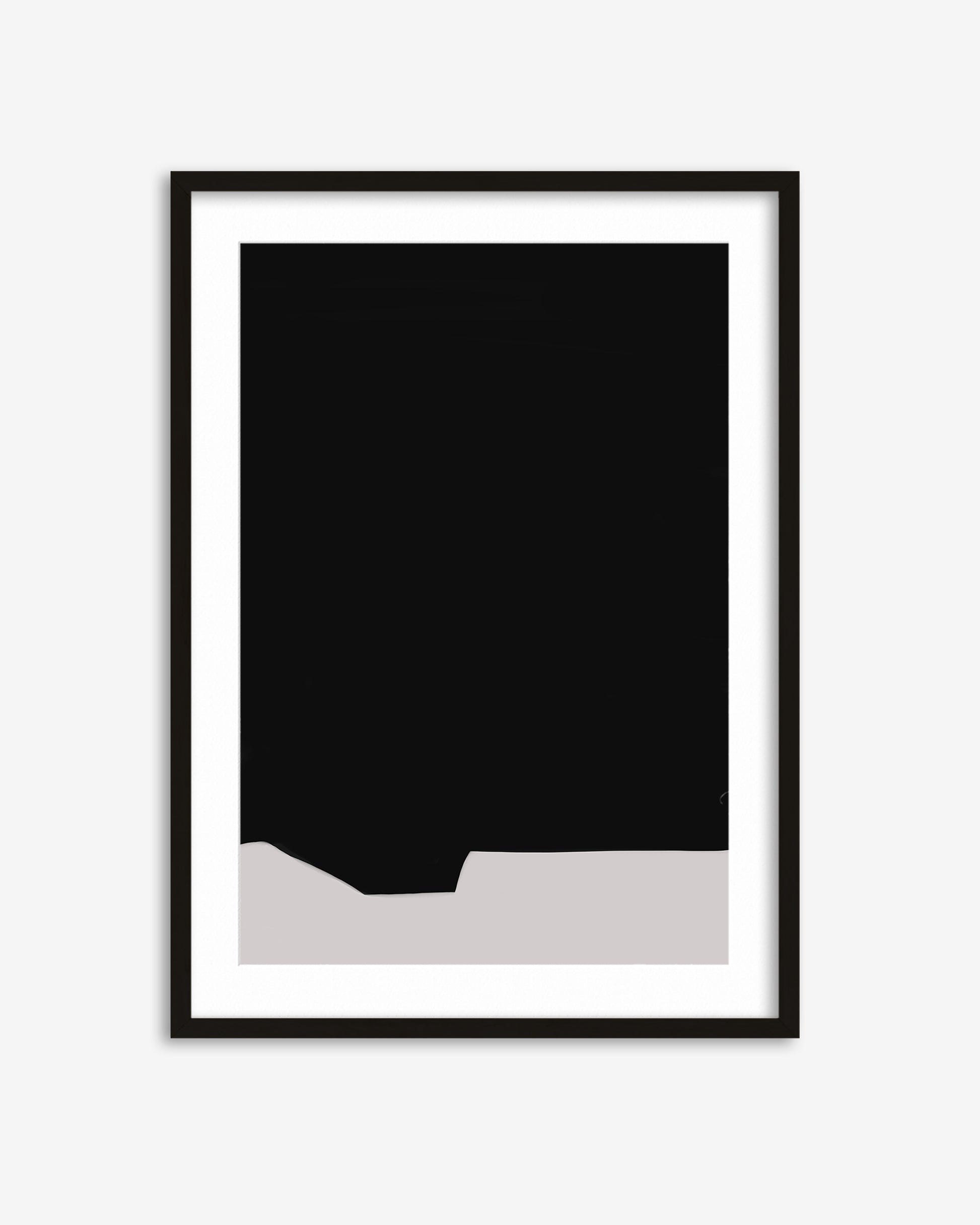 Framed black and white abstract art print on a white background