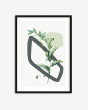 Framed artwork with a green plant design and abstract black shape on a white background