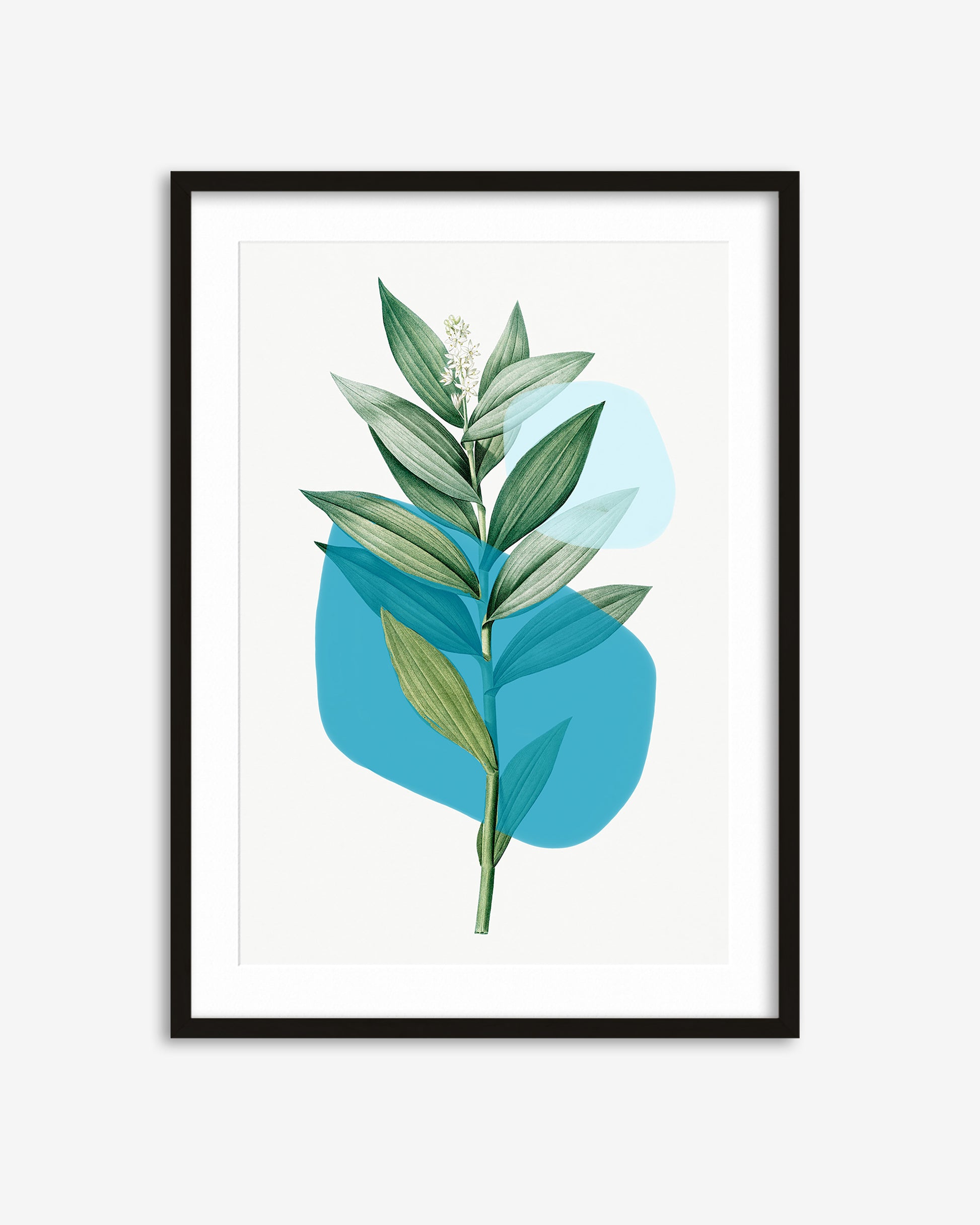 Framed artwork with green leaves on a blue background