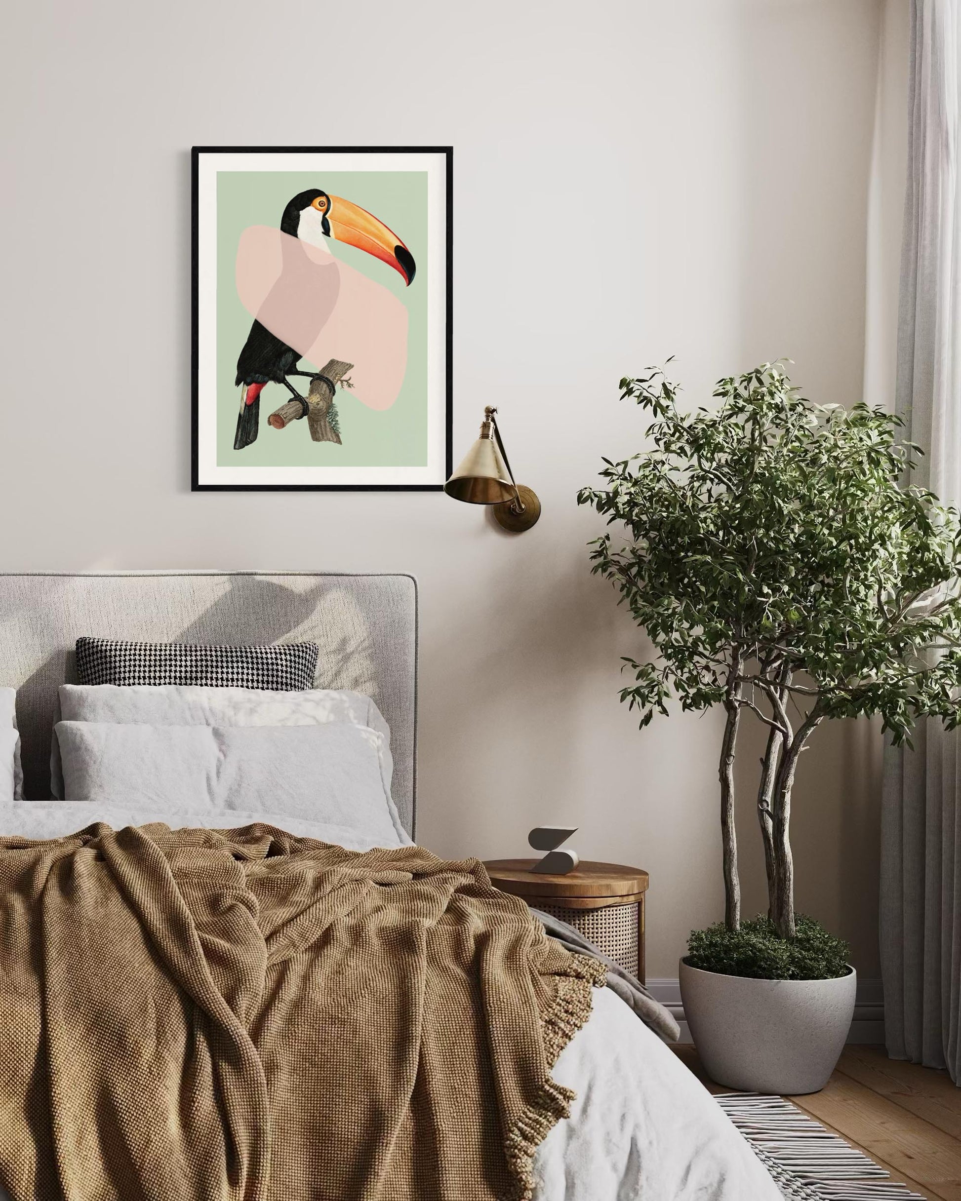 Bedroom with a toucan print on the wall, plant, and cozy bedding.