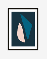 Framed abstract art print with geometric shapes on a dark blue background