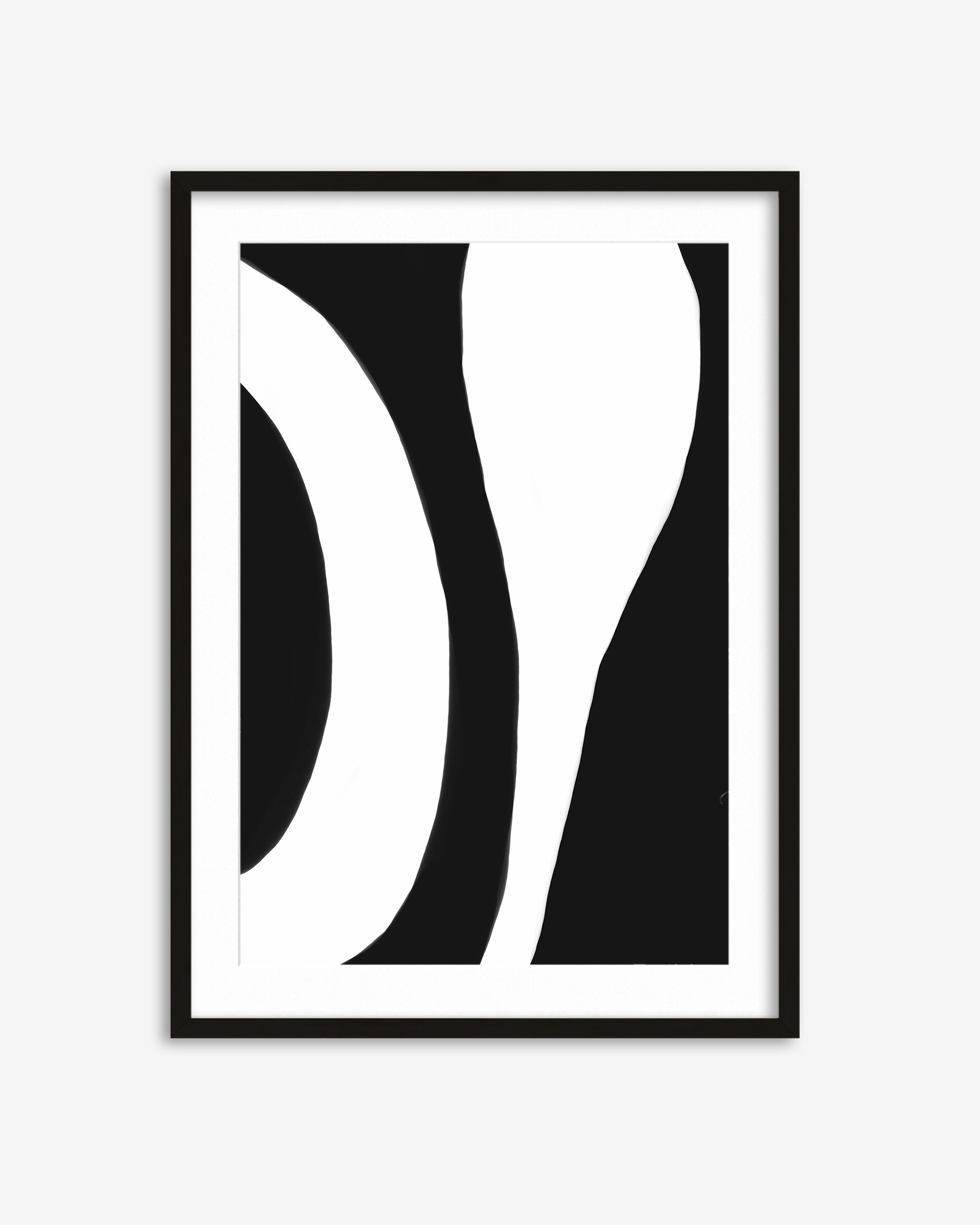 Framed abstract art with black and white design on a light gray background