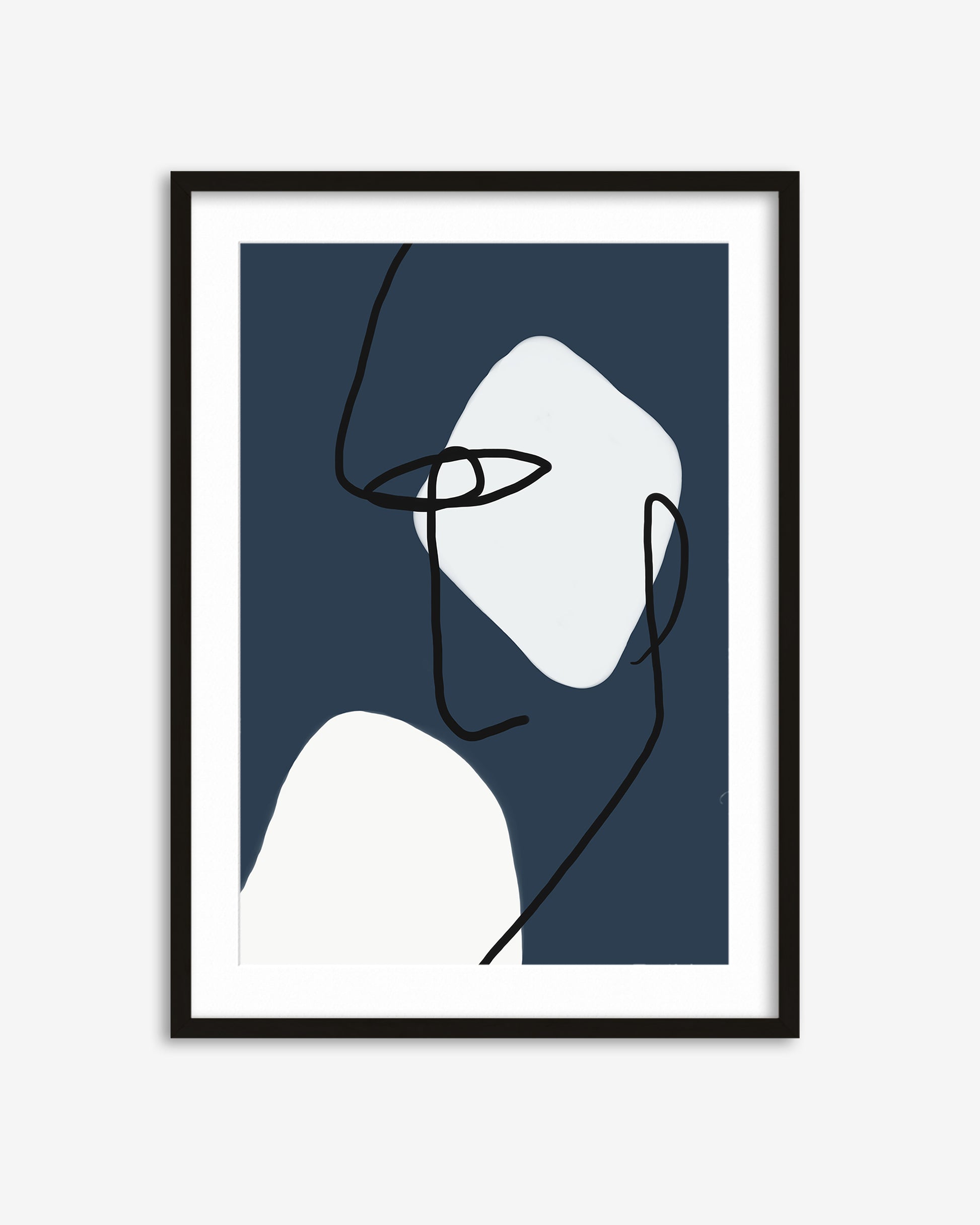 Framed abstract art print with a minimalist design on a blue background