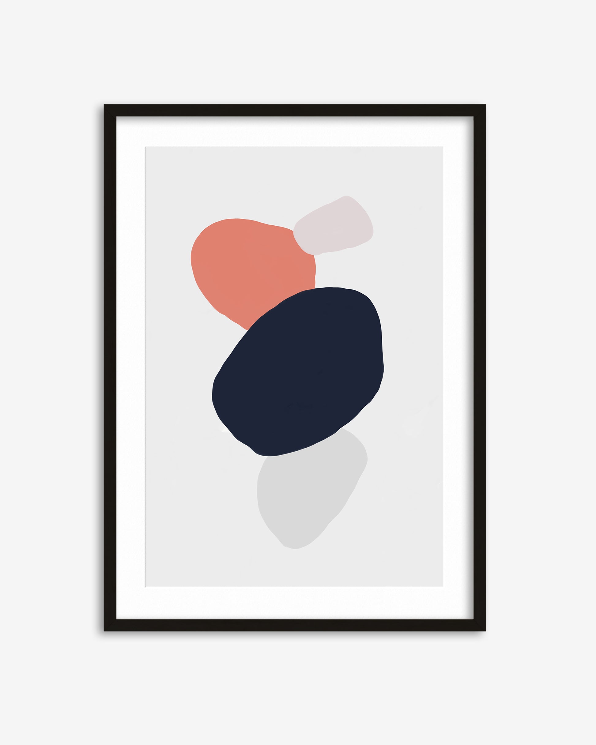 Framed abstract art print with geometric shapes on a white background