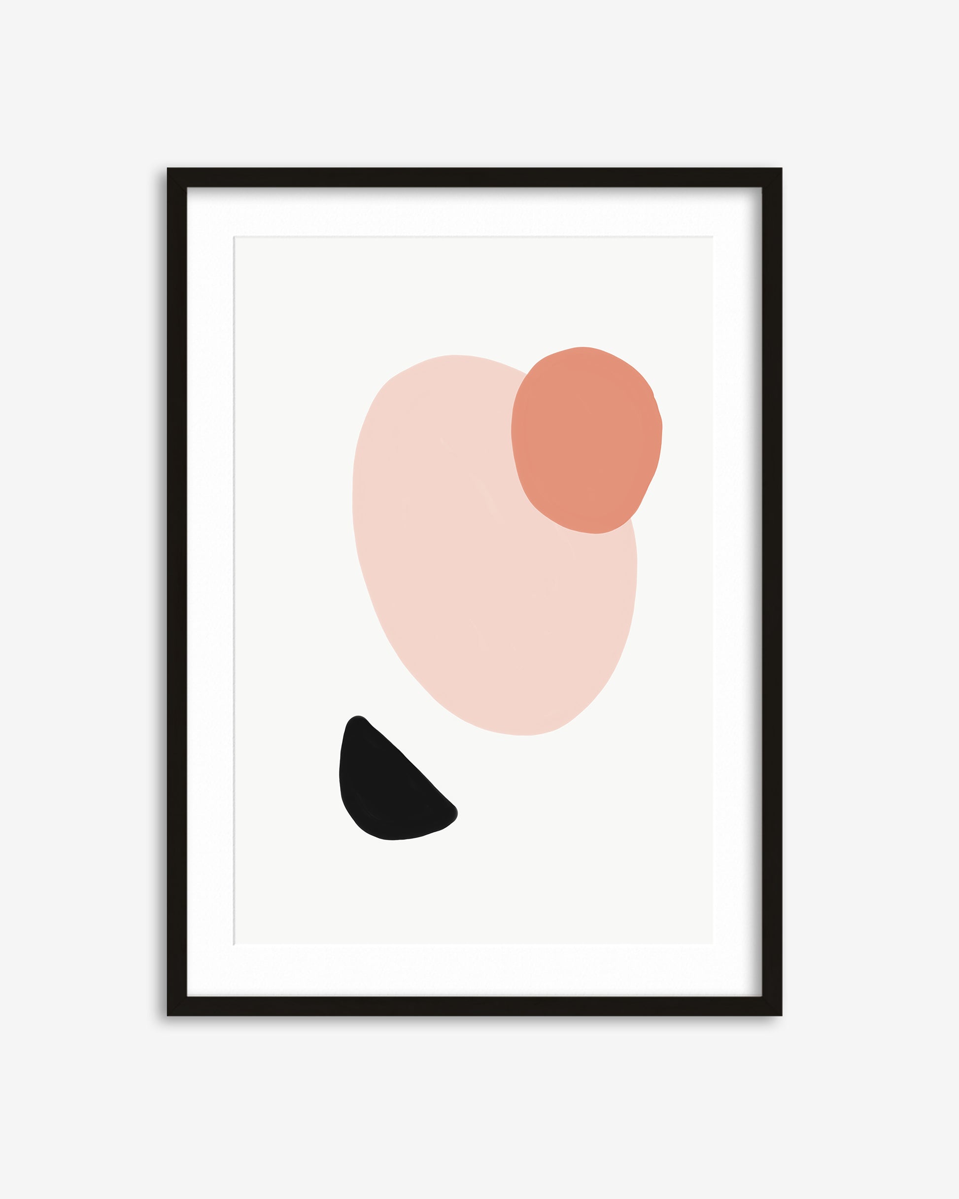 Framed abstract art print with pink, orange, and black shapes on a white background