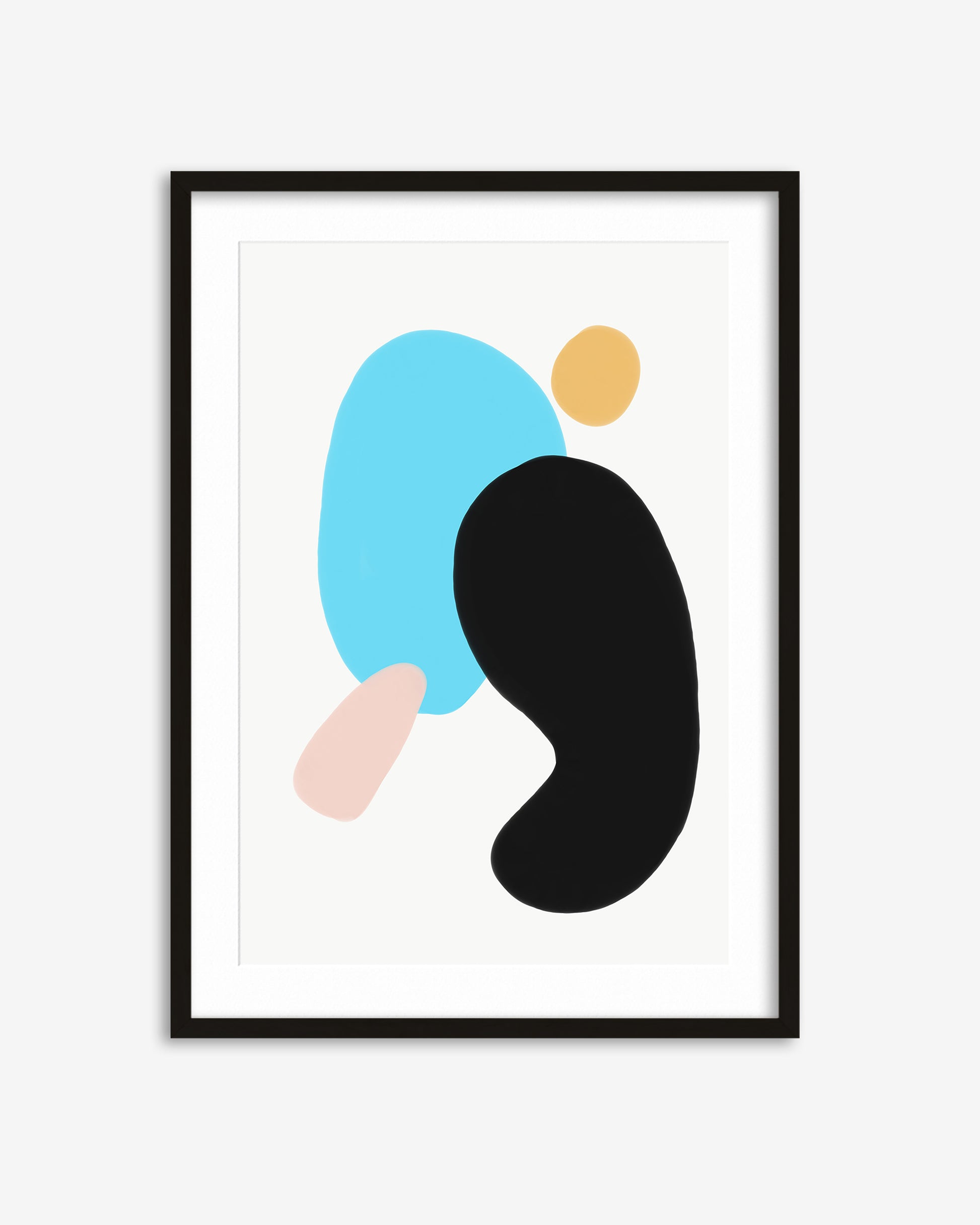Framed abstract art print with colorful shapes on a white background