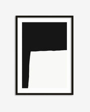 Framed black and white abstract art piece on a white background