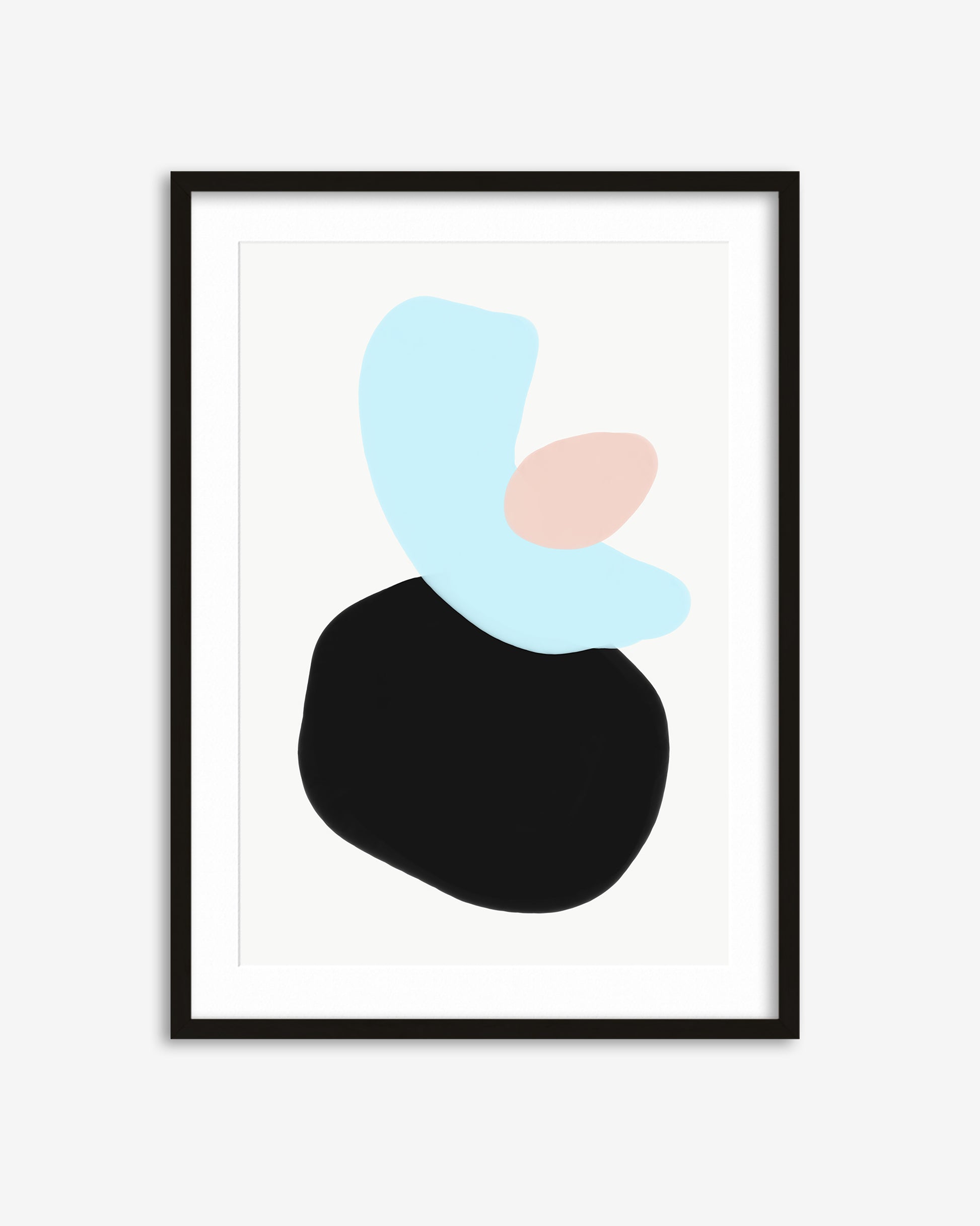 Framed abstract art print with black, blue, and pink shapes on a white background