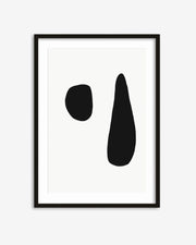 Framed abstract art print with two black shapes on a white background