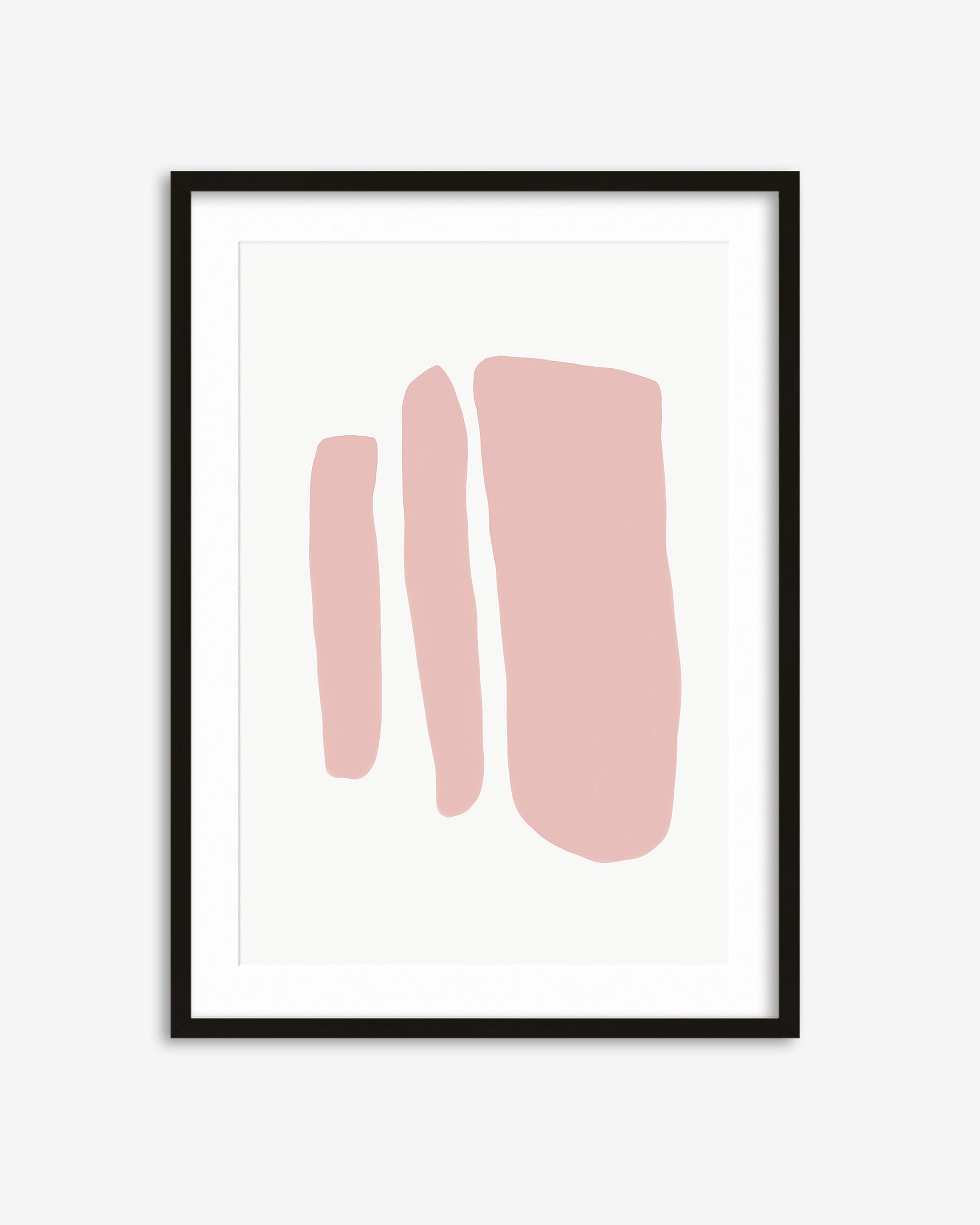 Framed abstract art print with pink shapes on a white background
