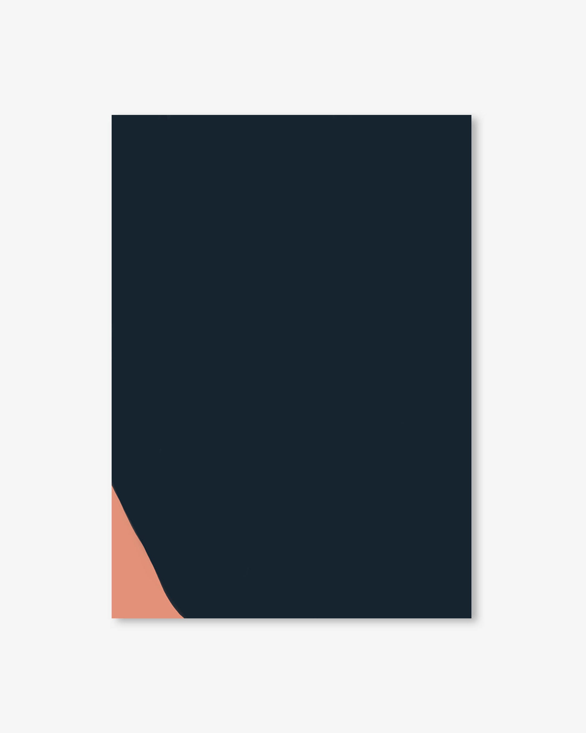 Black notebook with a pink corner on a white background