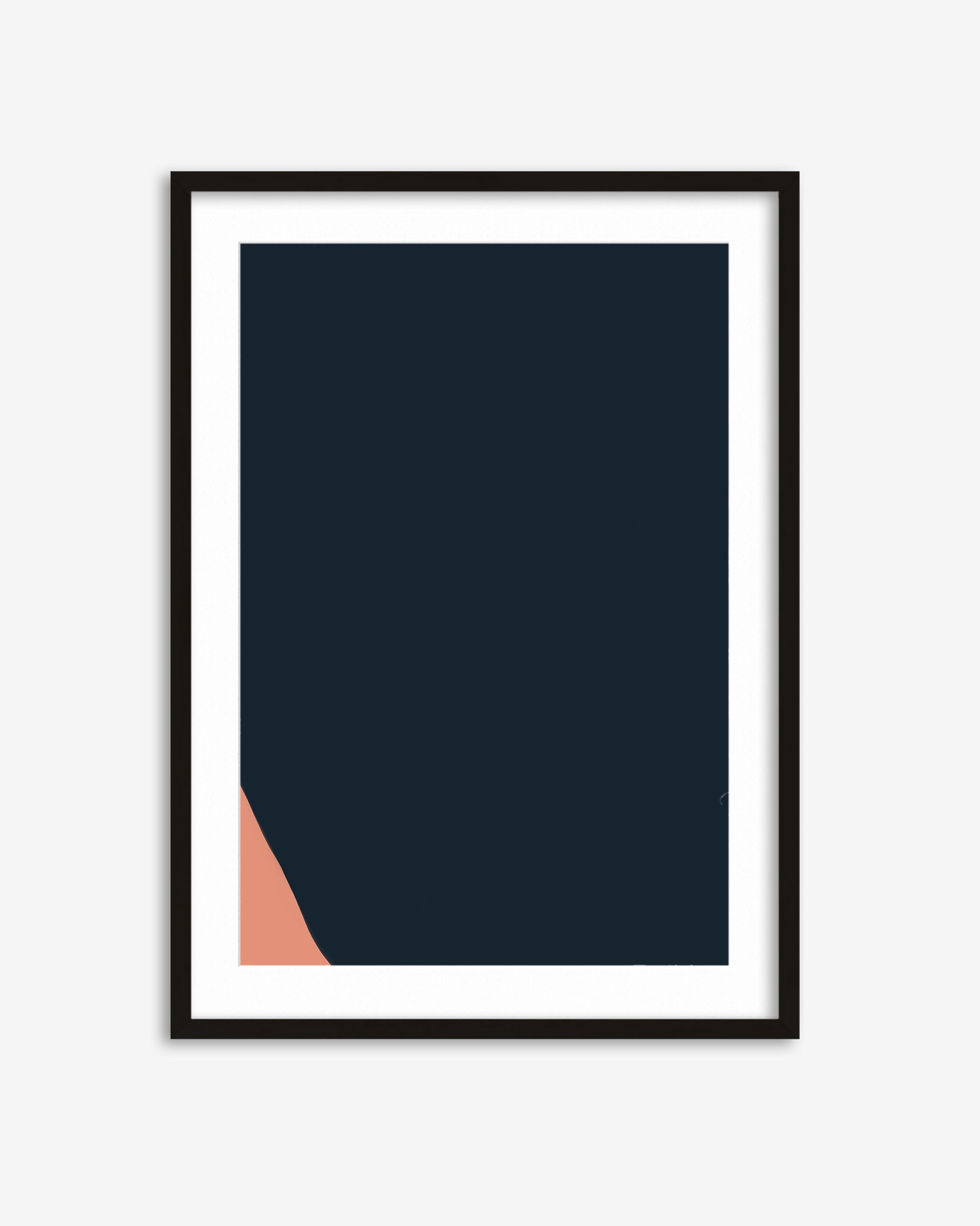 Framed artwork with a dark blue background and a small pink triangle on a white background