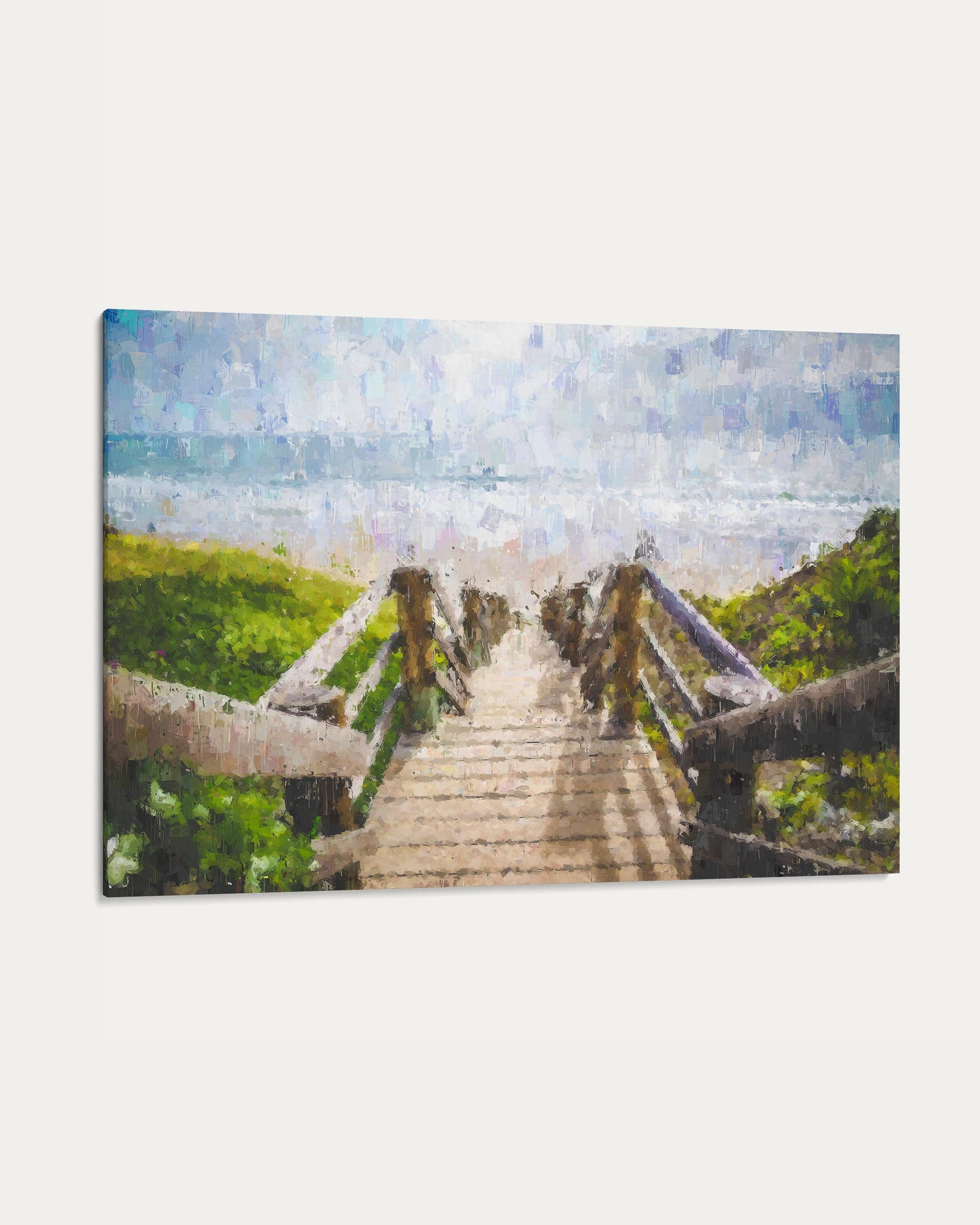 Wooden bridge over a stream with greenery on a clear day