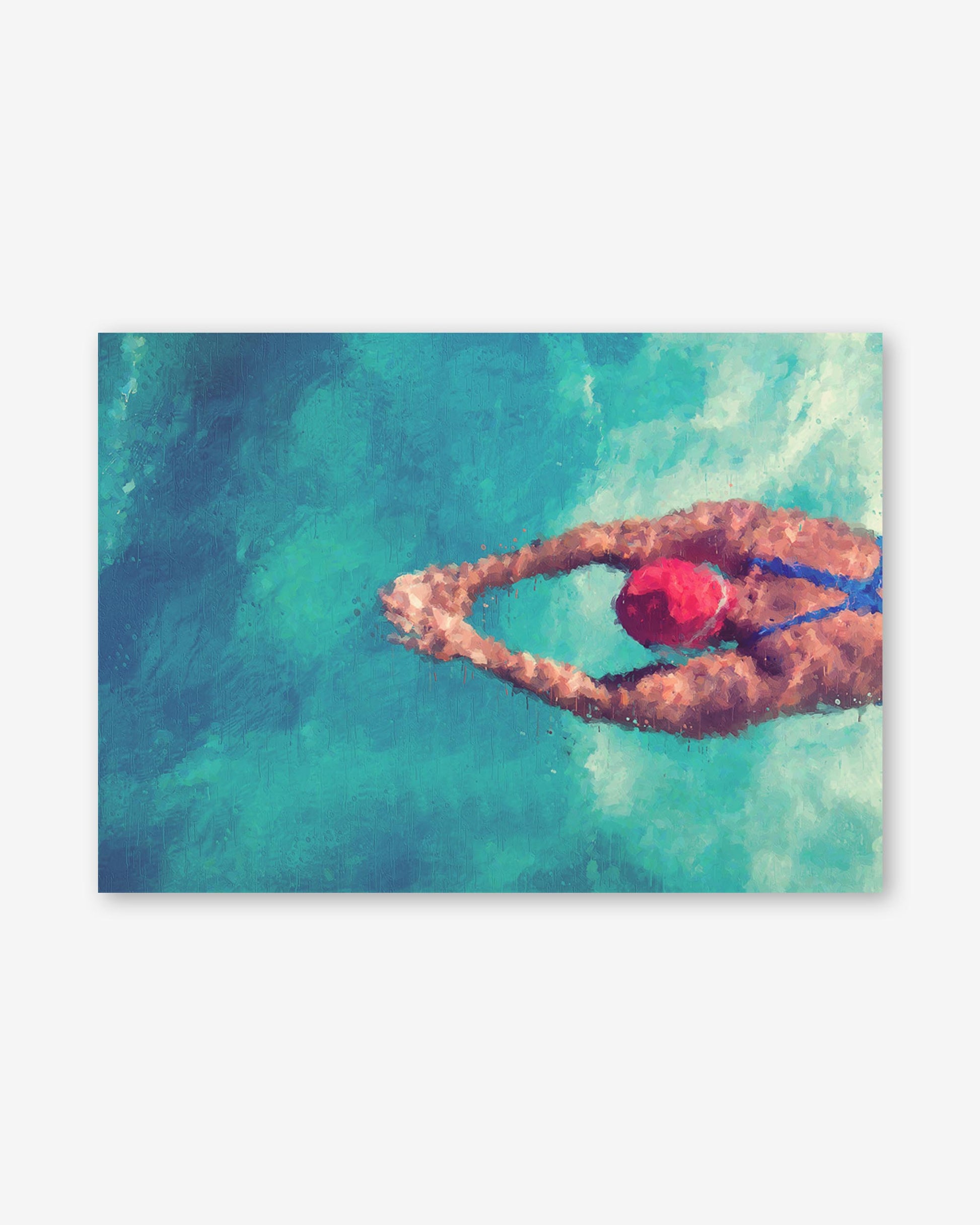 Person swimming underwater with a heart-shaped bubble in clear blue water