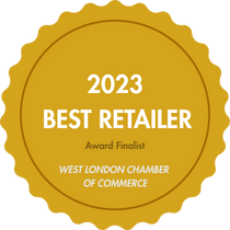 Gold badge with '2023 Best Retailer' text and 'West London Chamber of Commerce' on a gold background