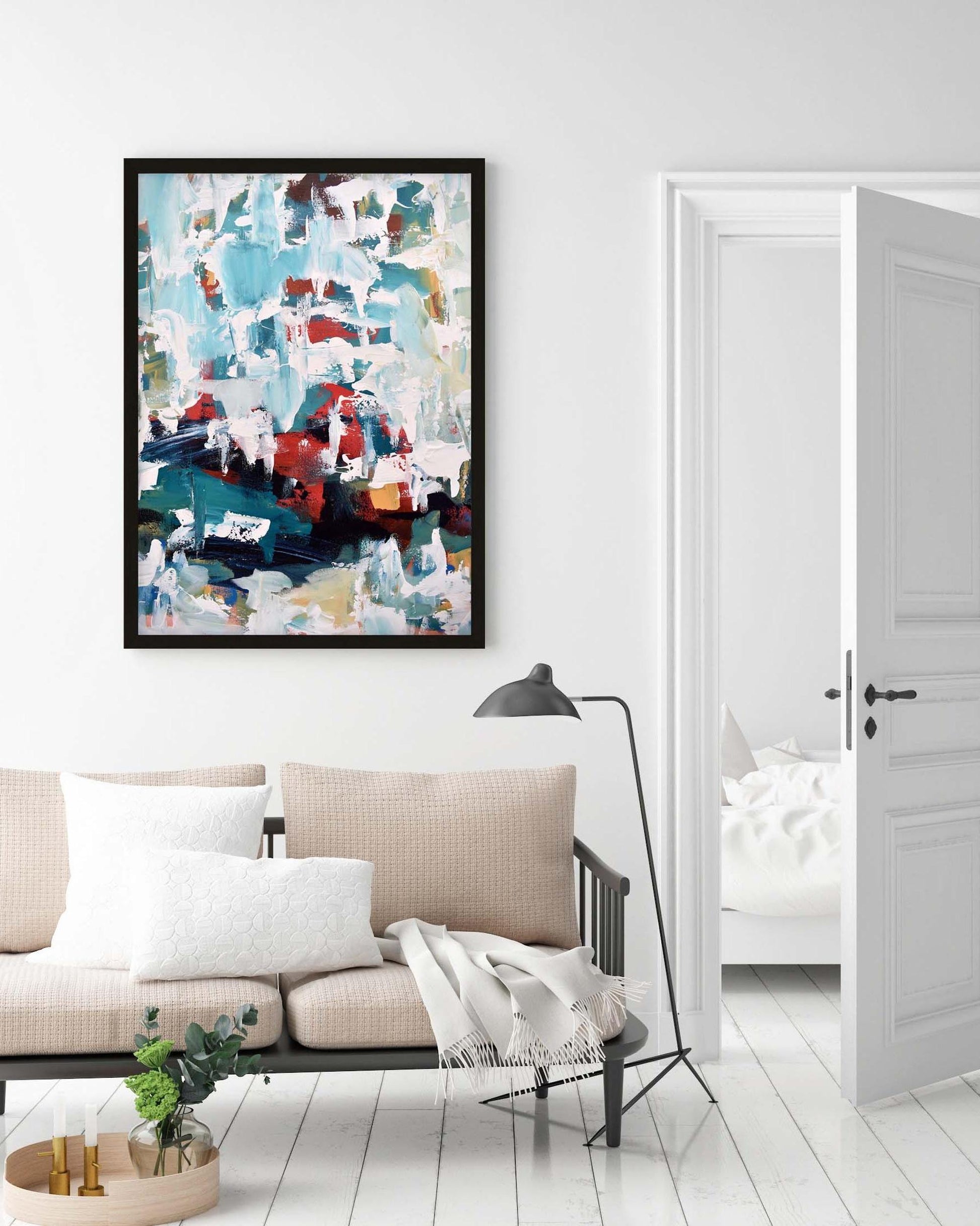 Living room with a colorful abstract painting on the wall