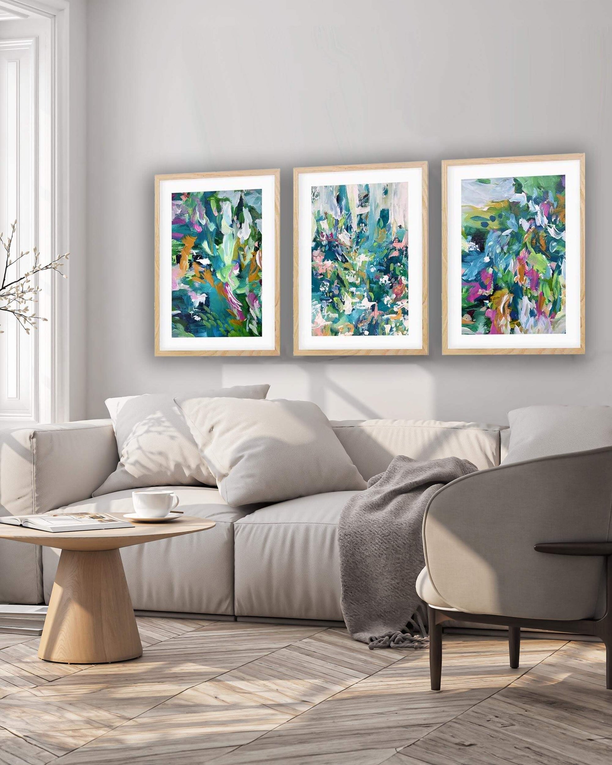 living room trio set of three abstract art prints framed in contemporary modern living room with Japanese table