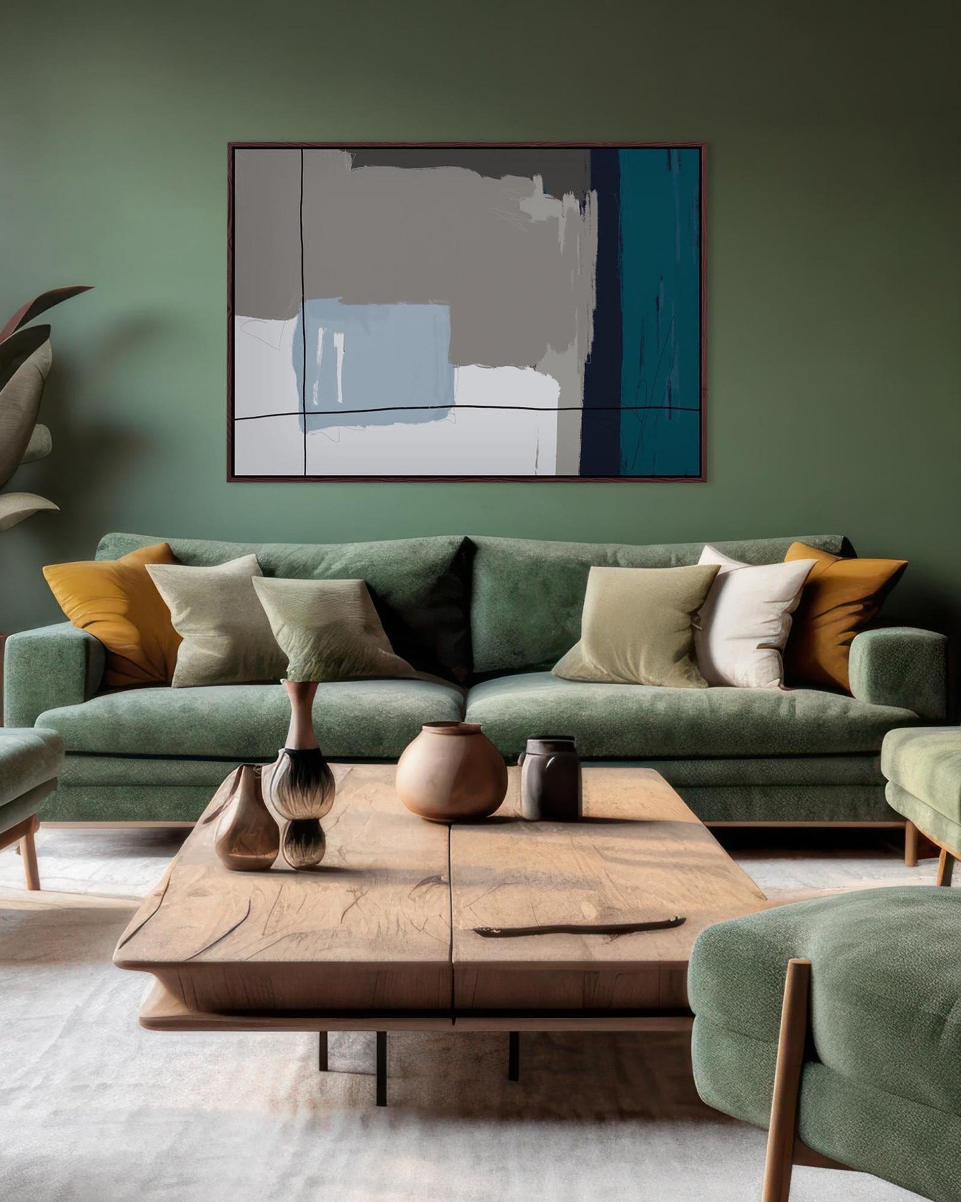 Modern living room with green sofa, abstract art, and wooden coffee table.