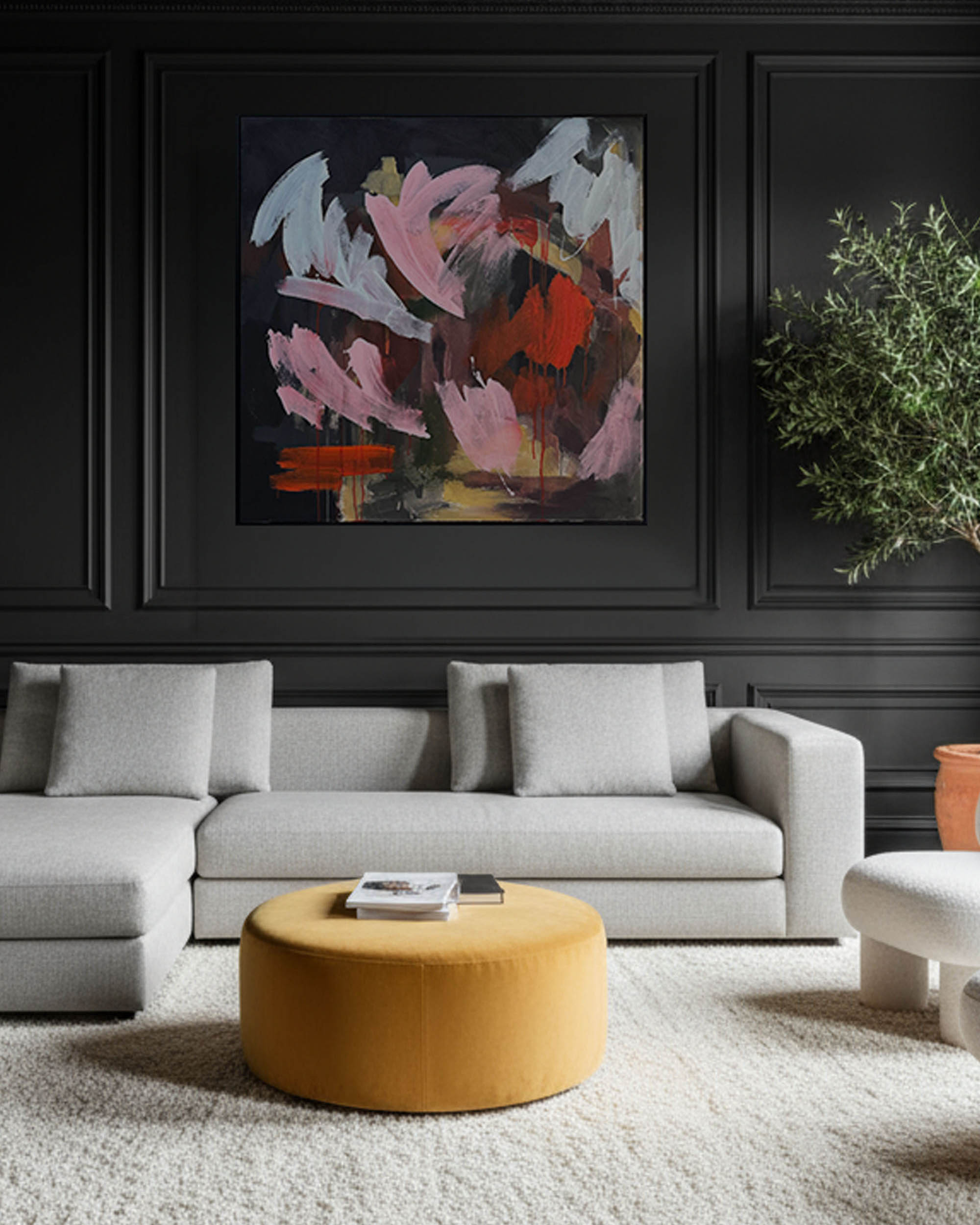 statement large original abstract expressionist painting in luxury home living room interior with boucle sofa.