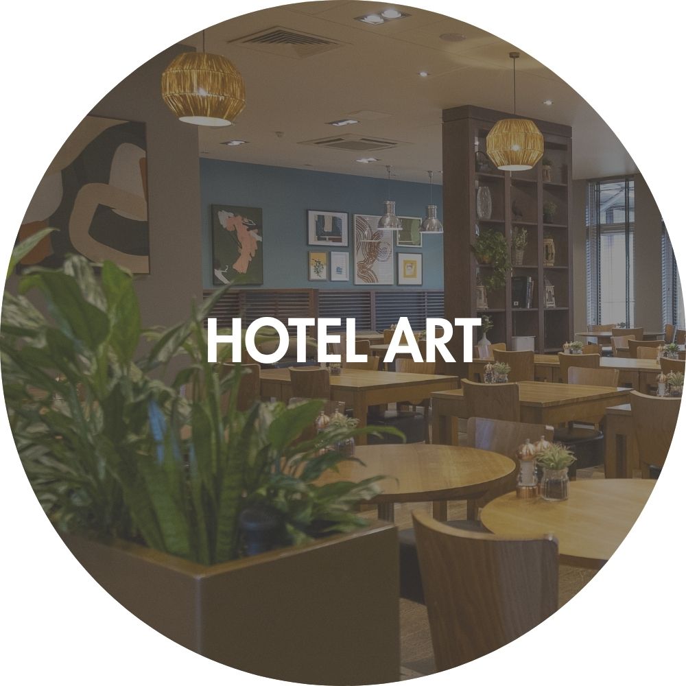 Modern luxury high end restaurant interior with tables, chairs, and modern mid century wall art with 'HOTEL ART' text overlay.