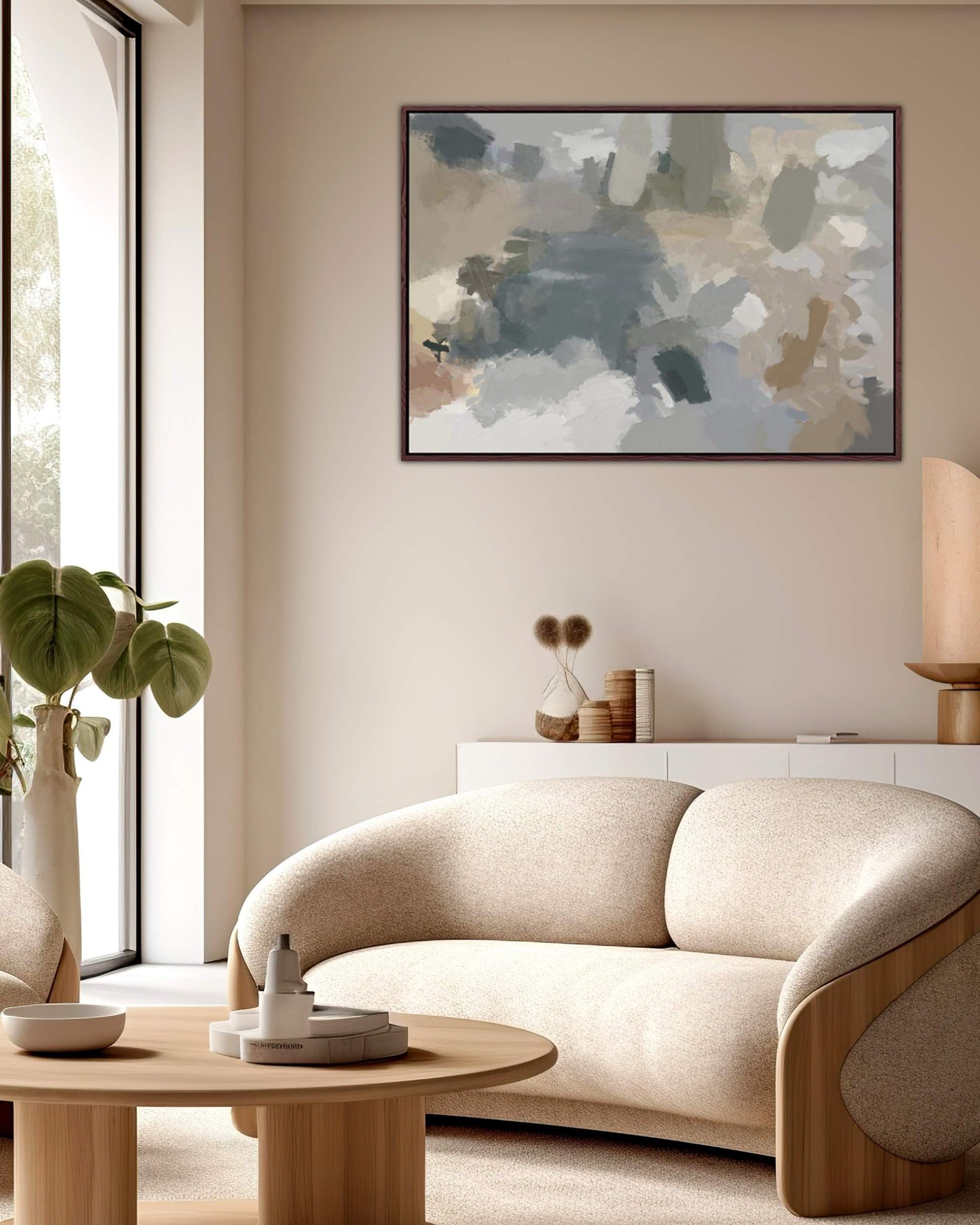 Modern living room with a beige sofa, wooden coffee table, and abstract painting on the wall.