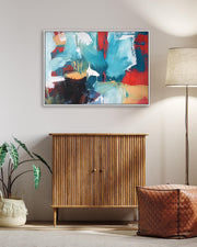 Modern interior with a wooden cabinet, abstract painting, and decorative items.