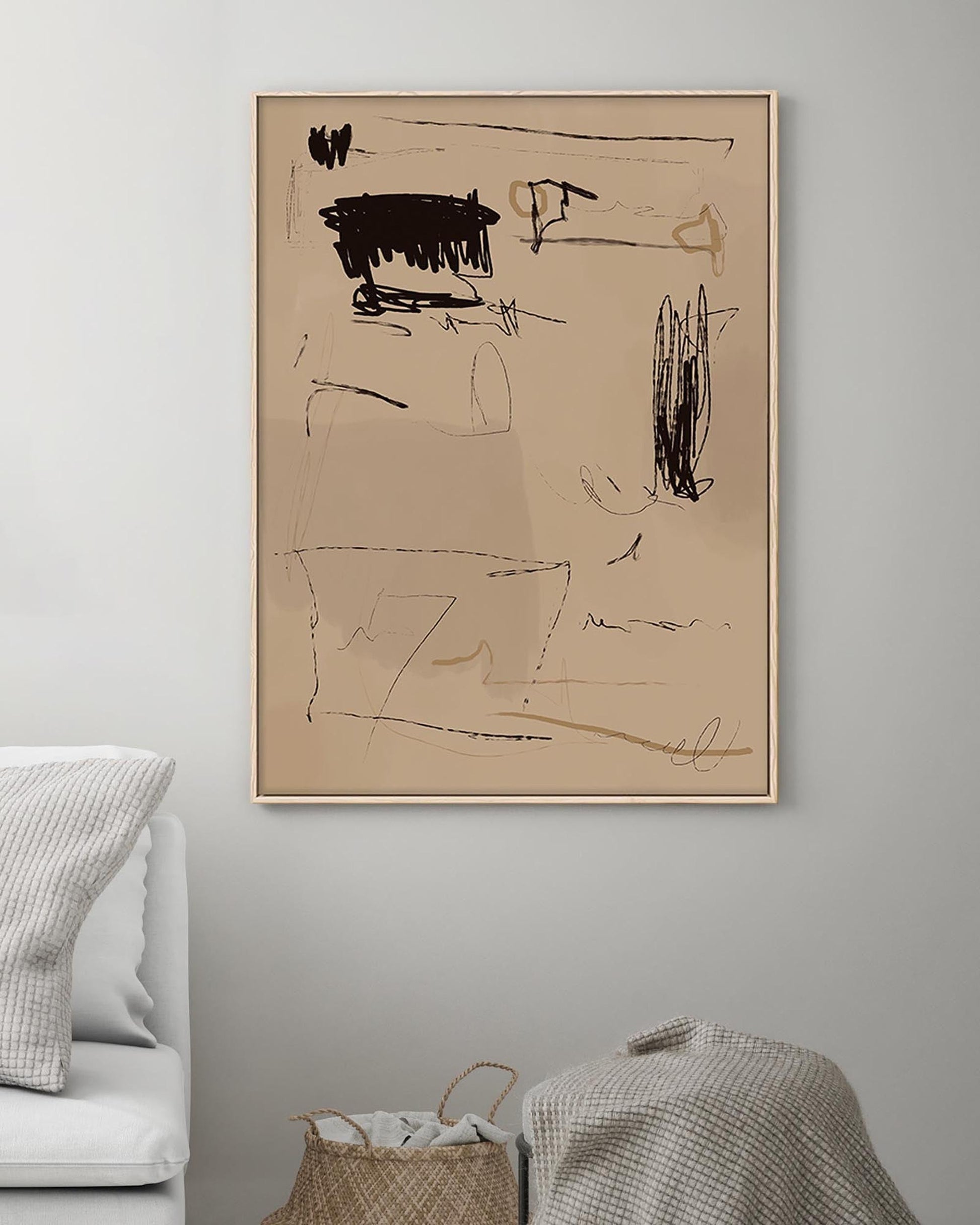 Abstract art piece on a wall in a living room setting