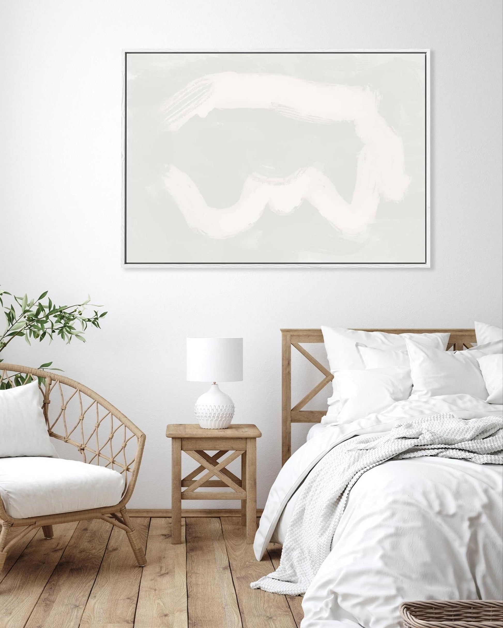 Modern bedroom with a bed, chair, and abstract artwork on the wall.