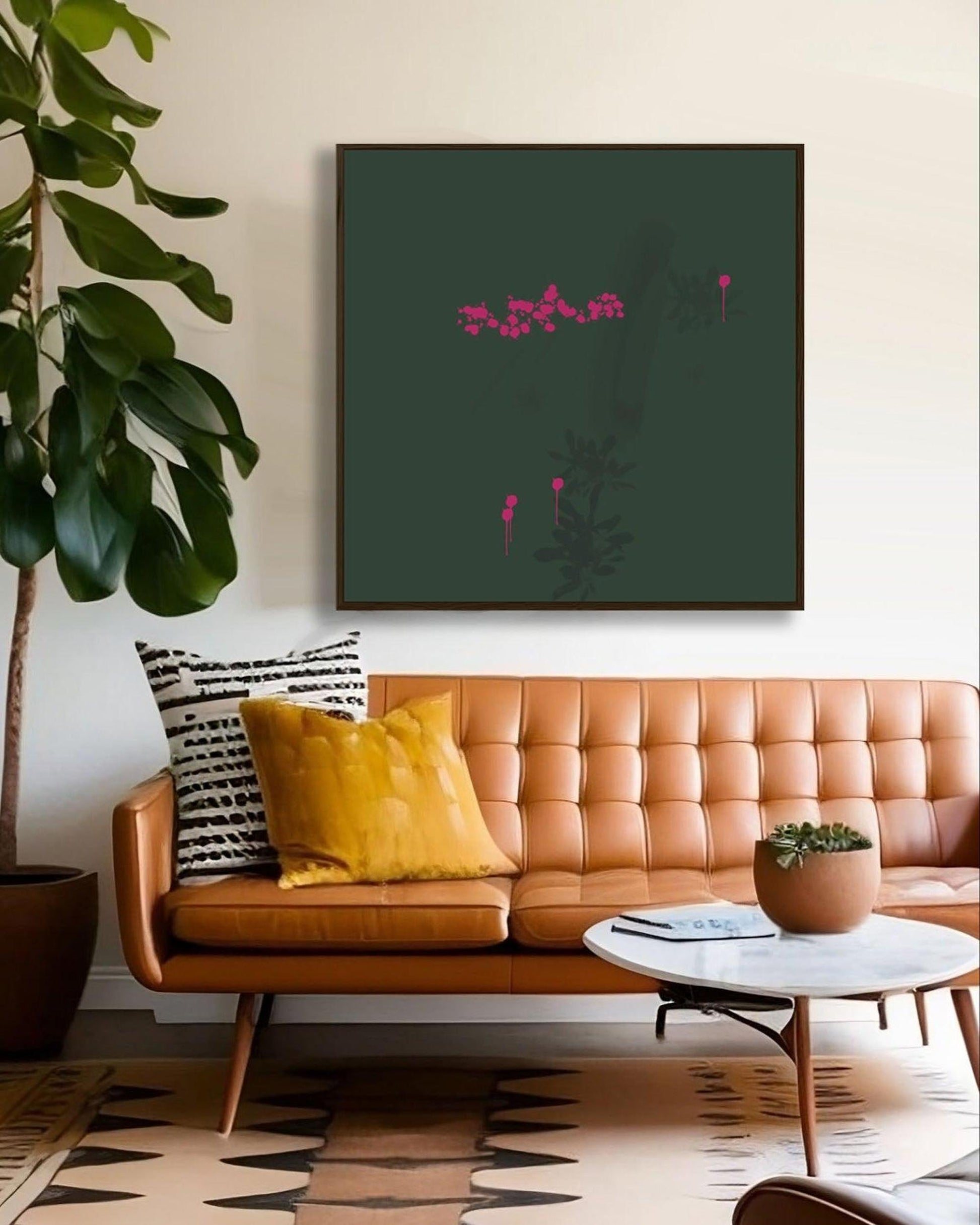 Living room with a brown leather sofa, yellow pillow, and abstract art on the wall.