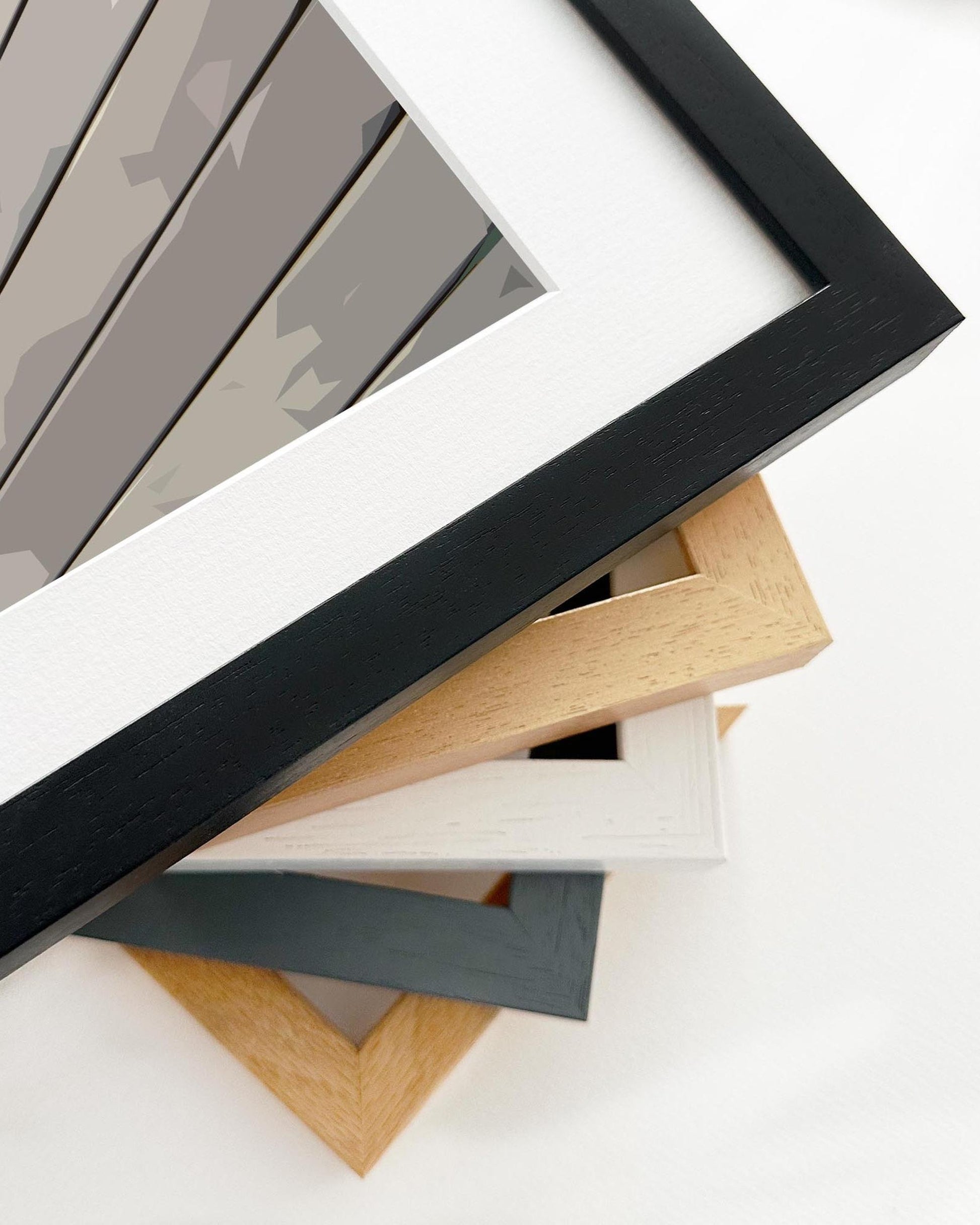 Stack of various photo frames on a white background
