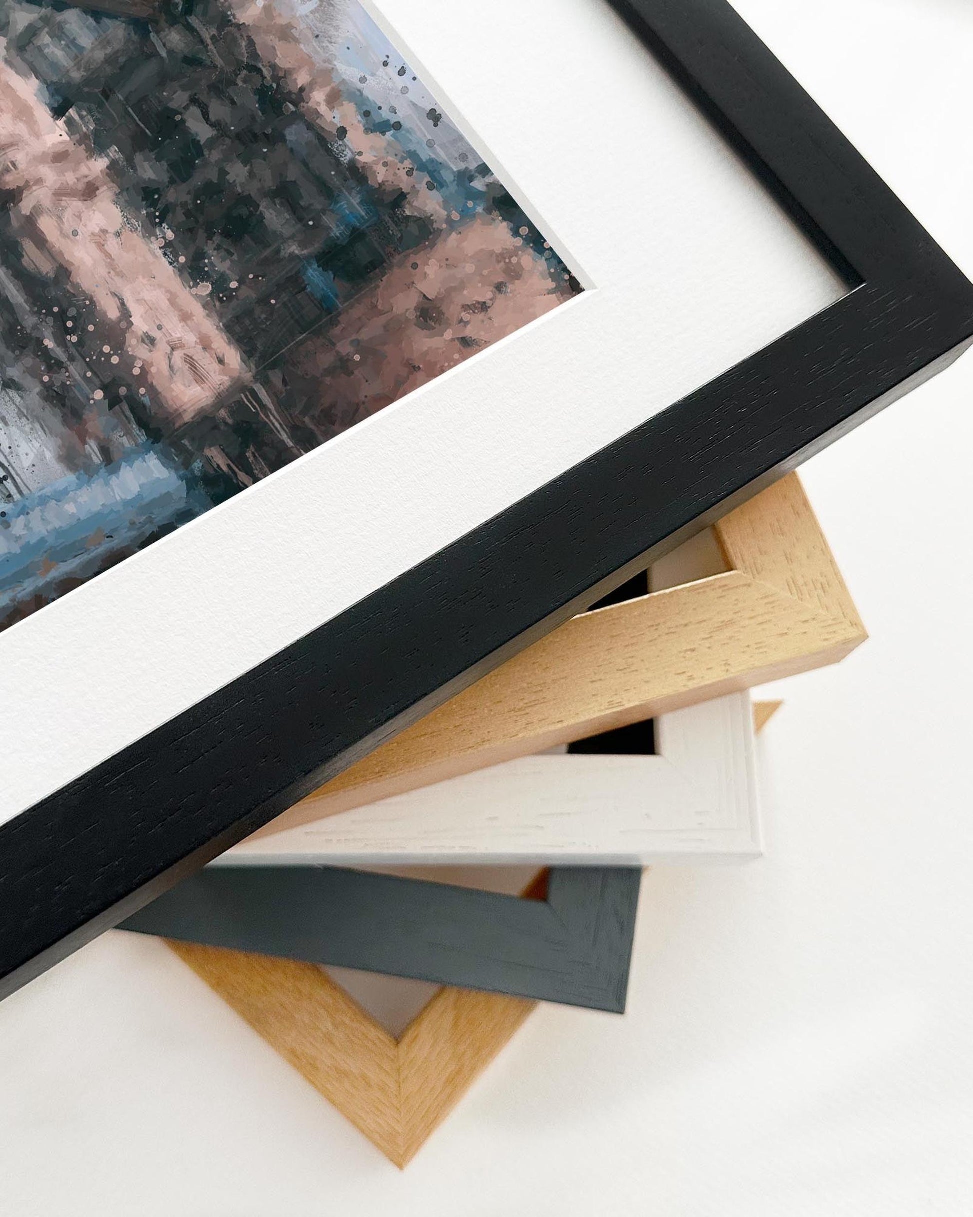 Collection of various photo frames on a white surface